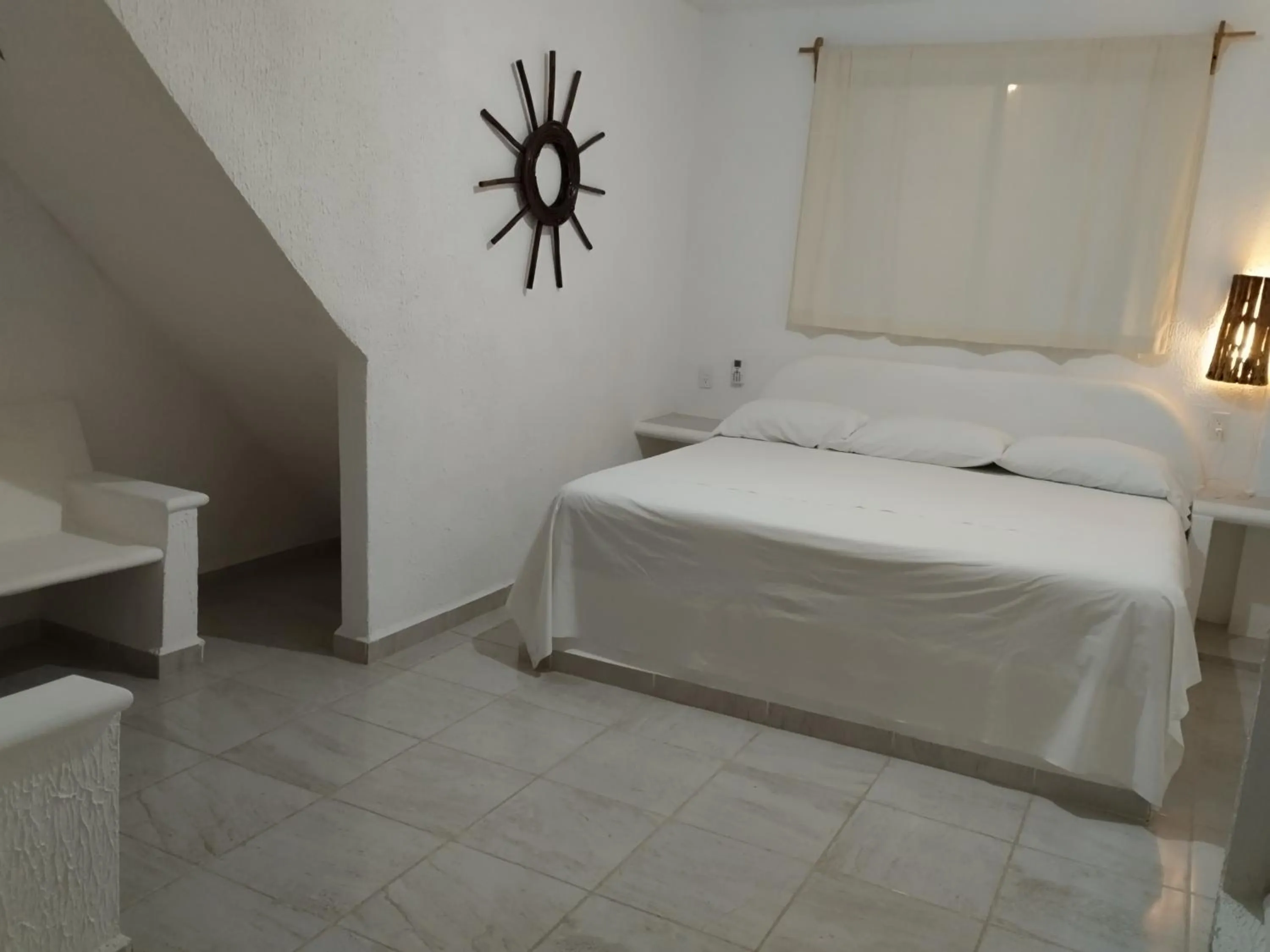 Bed in QUINTA DIAMANTE villas&hotel