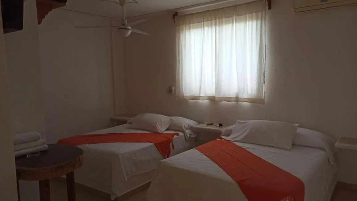 Bed in QUINTA DIAMANTE villas&hotel