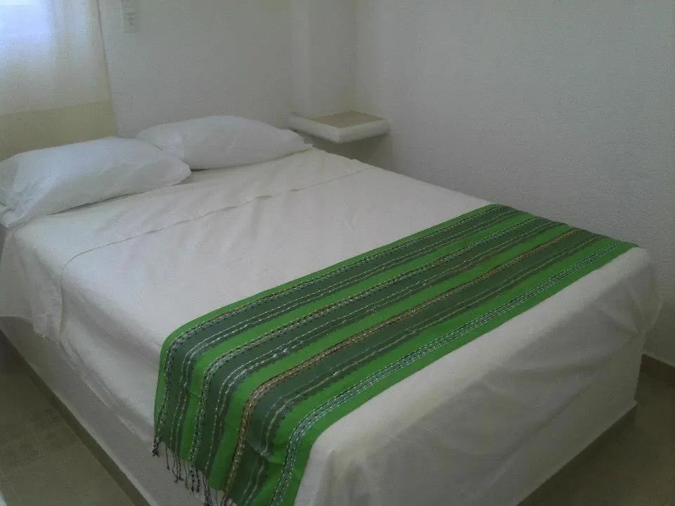 Bed in QUINTA DIAMANTE villas&hotel