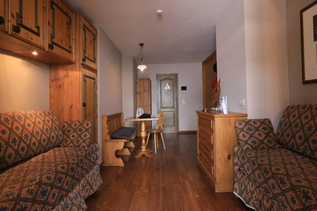 Seating area in Hotel Perla***