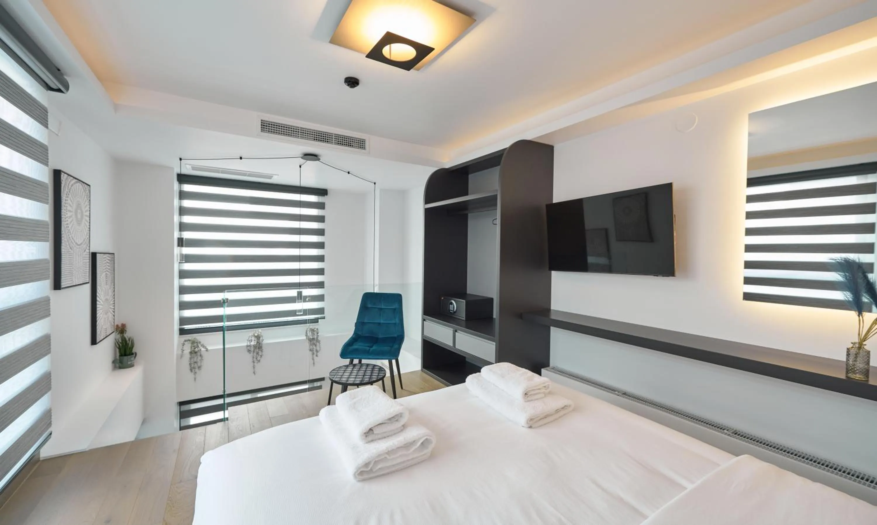 Bedroom, Bed in SIGMA Suites Hotel