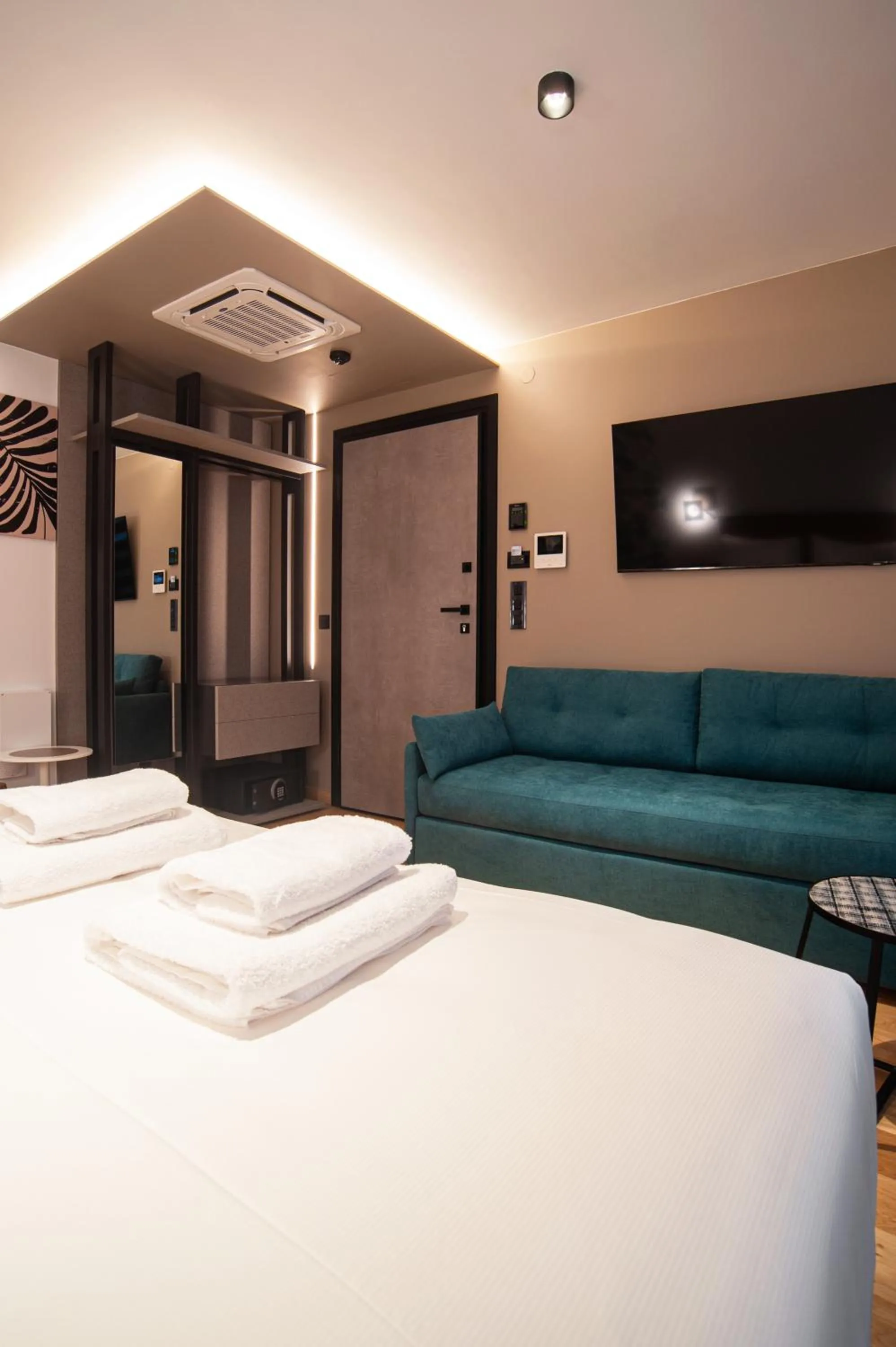 Bed in SIGMA Suites Hotel