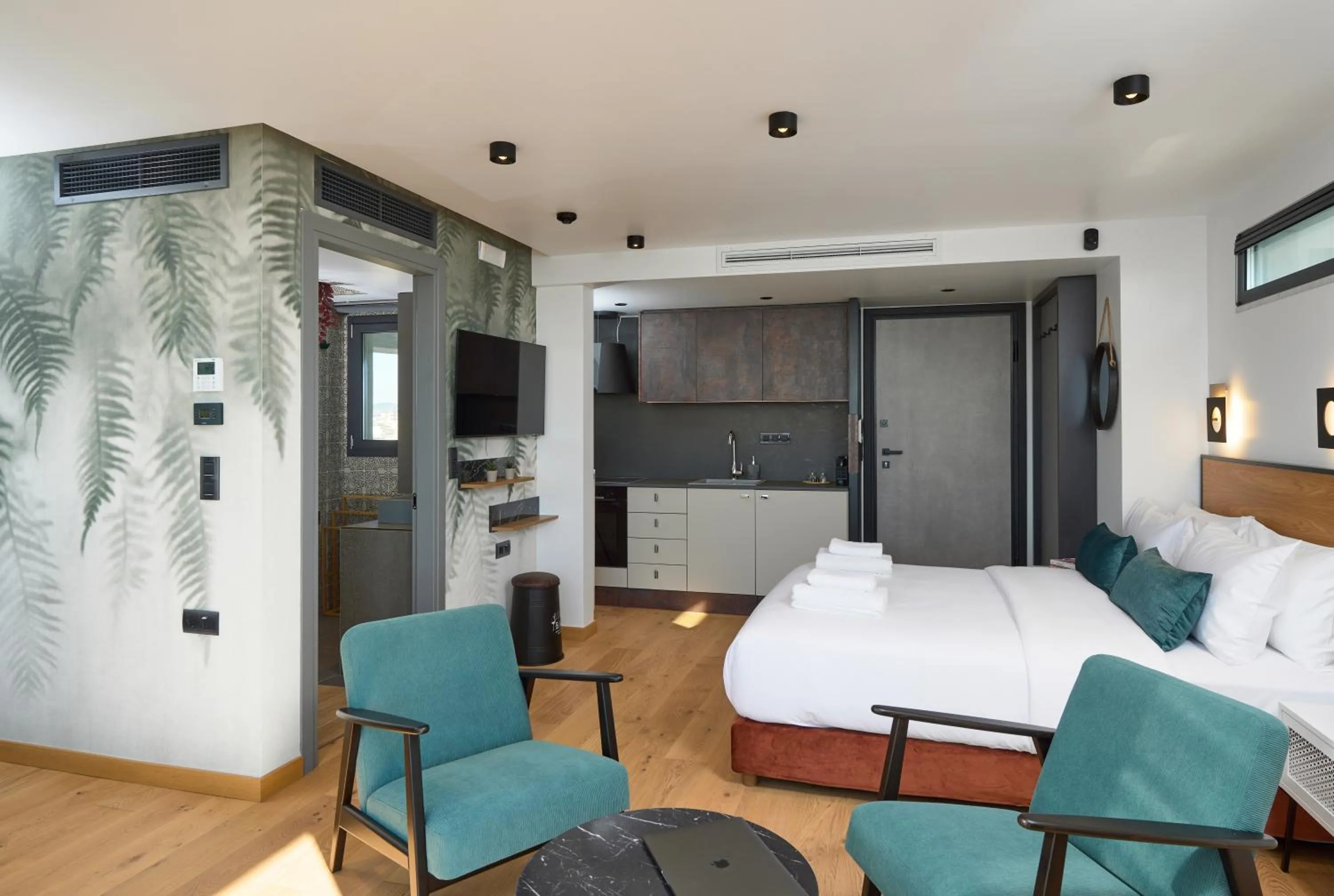 Photo of the whole room, Bed in SIGMA Suites Hotel