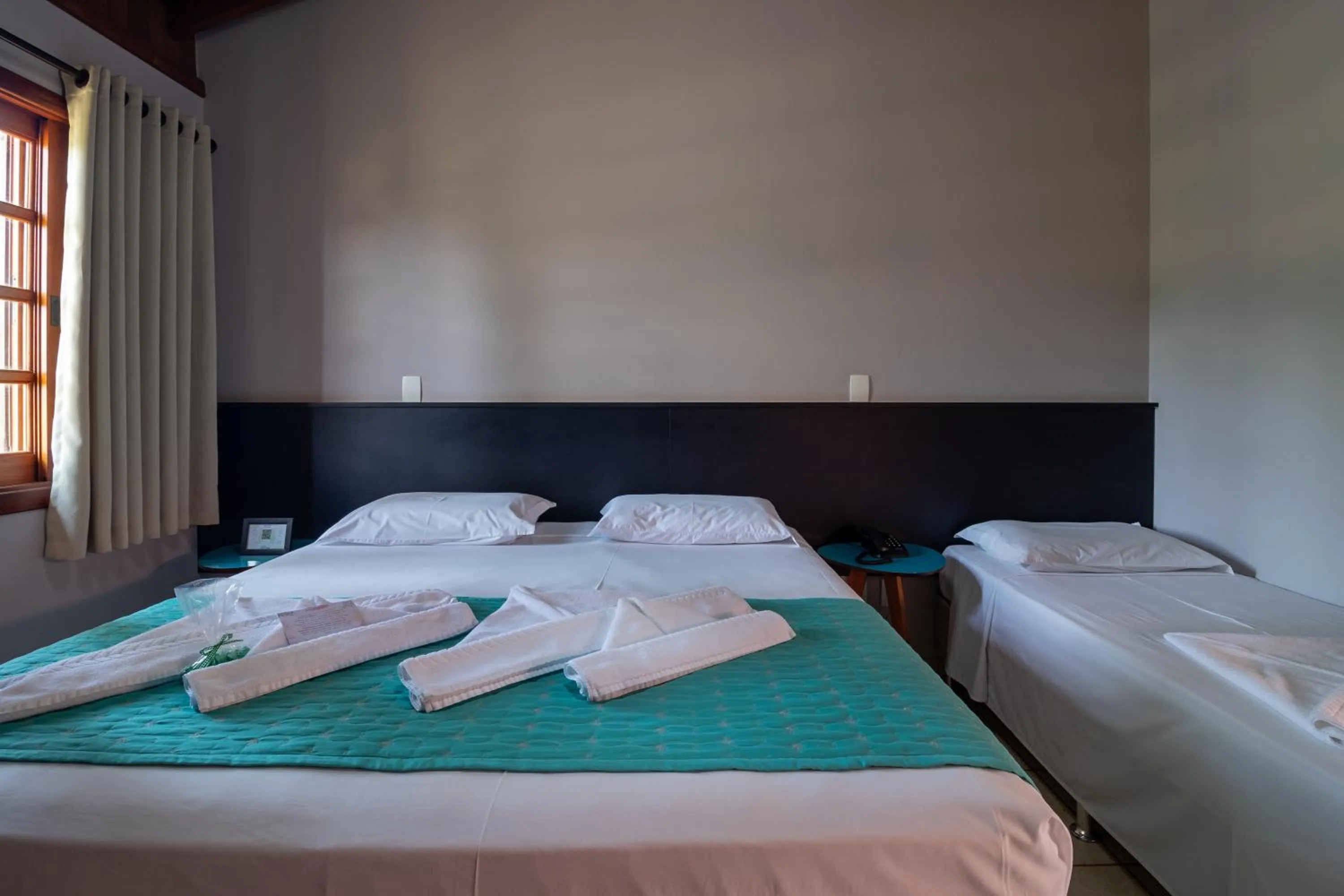 Bed in Pousada Pé na Terra