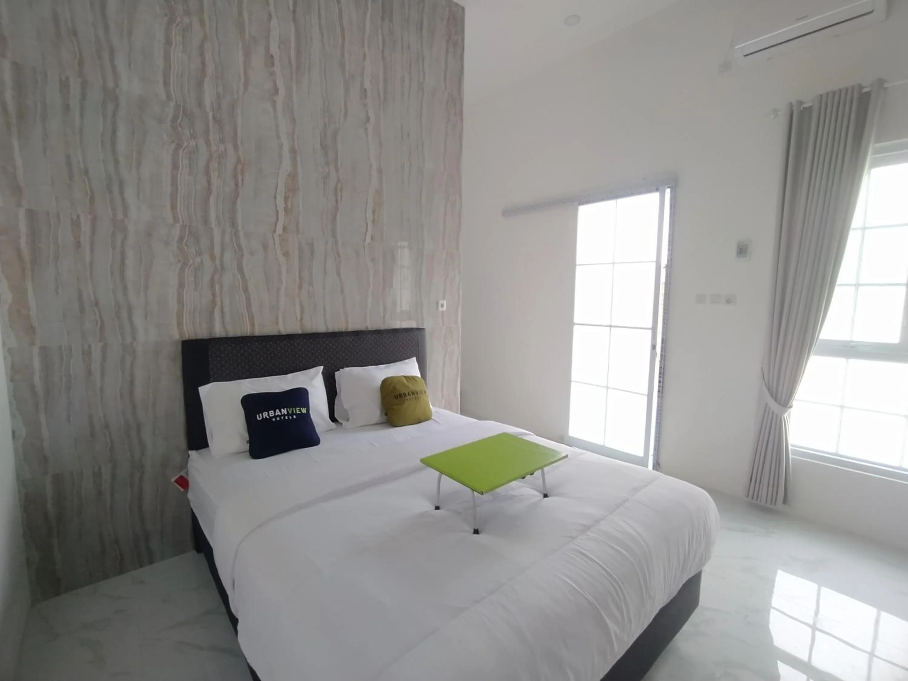 Bedroom, Bed in Urbanview Hotel Nimara Ngawi by RedDoorz
