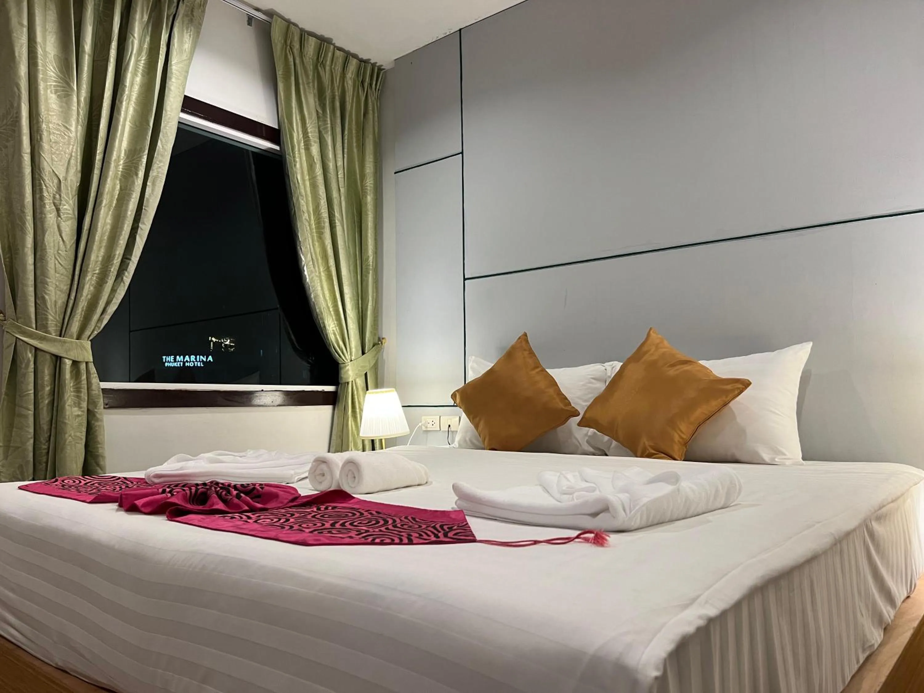 Bed in Zephyr Grand Hotel