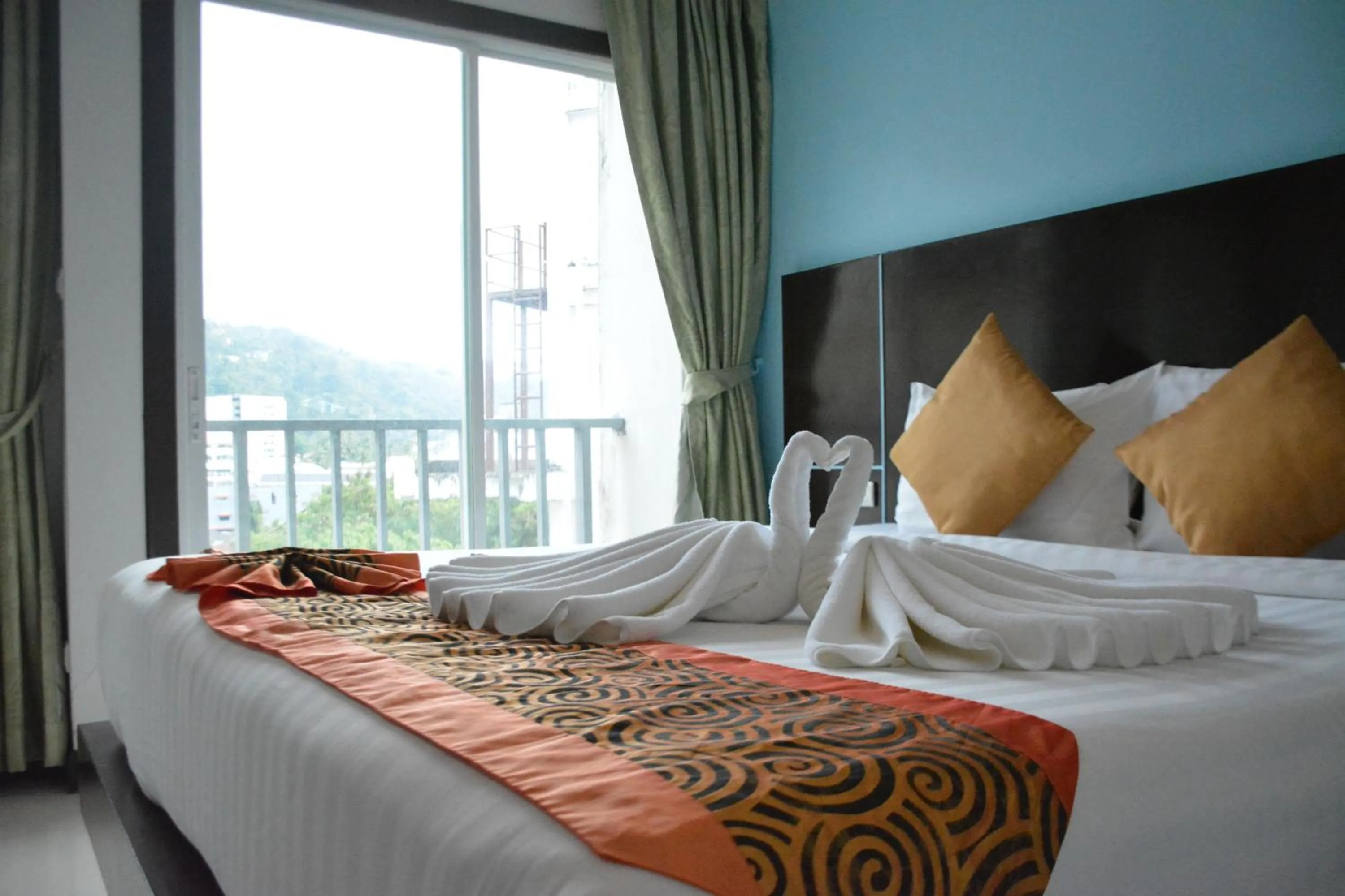 Bed in Zephyr Grand Hotel