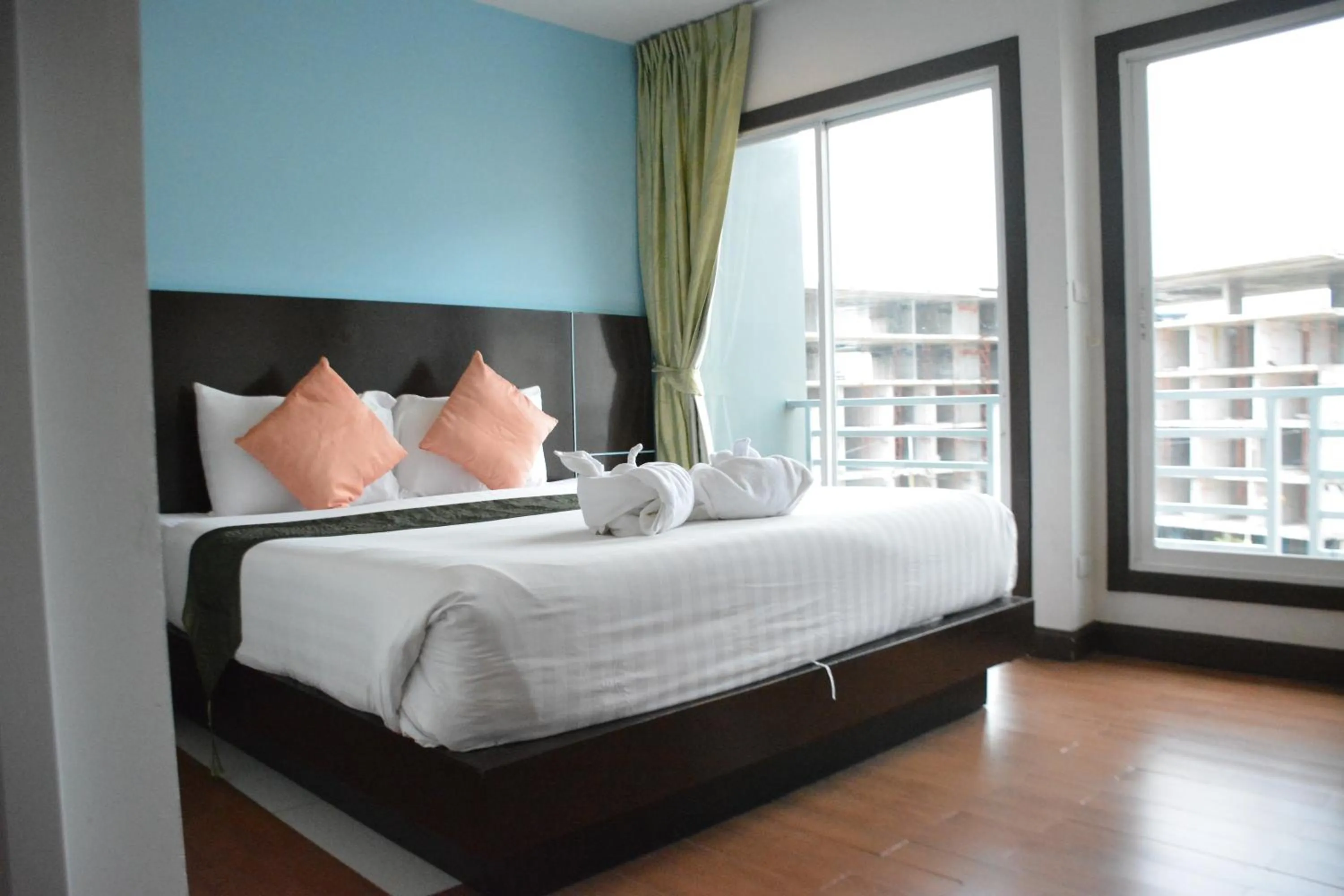 Bed in Zephyr Grand Hotel