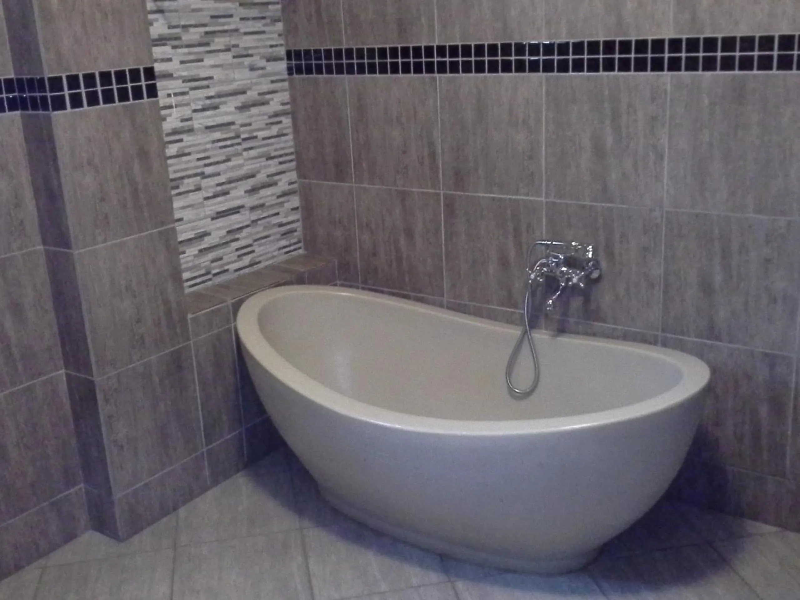 Bathroom in Tropical Enclave Hotel