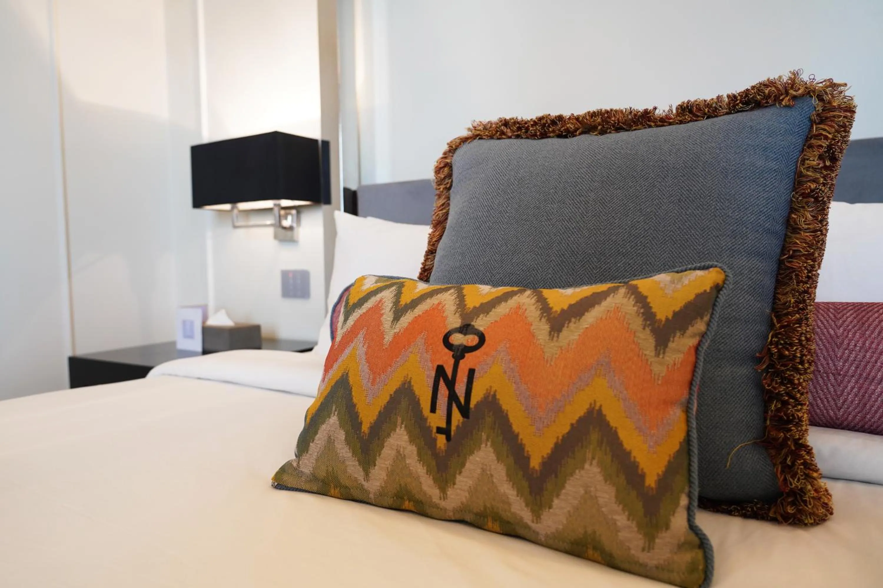 Bed in The Nishat Hotel