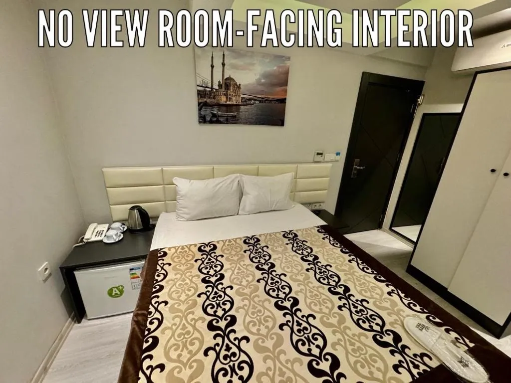 Bed in Aram Edessa Hotel