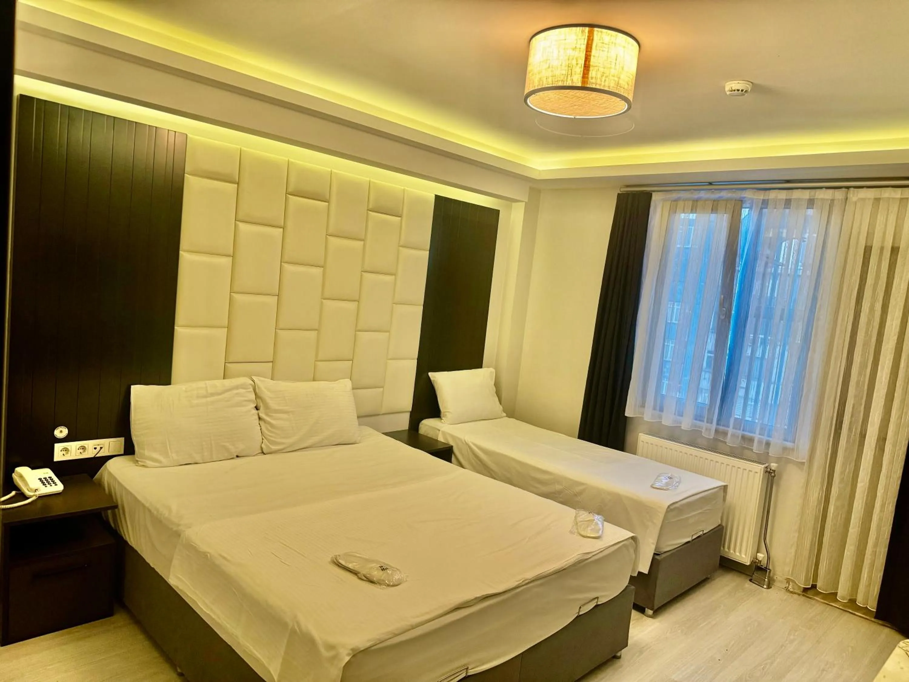 Bed in Aram Edessa Hotel