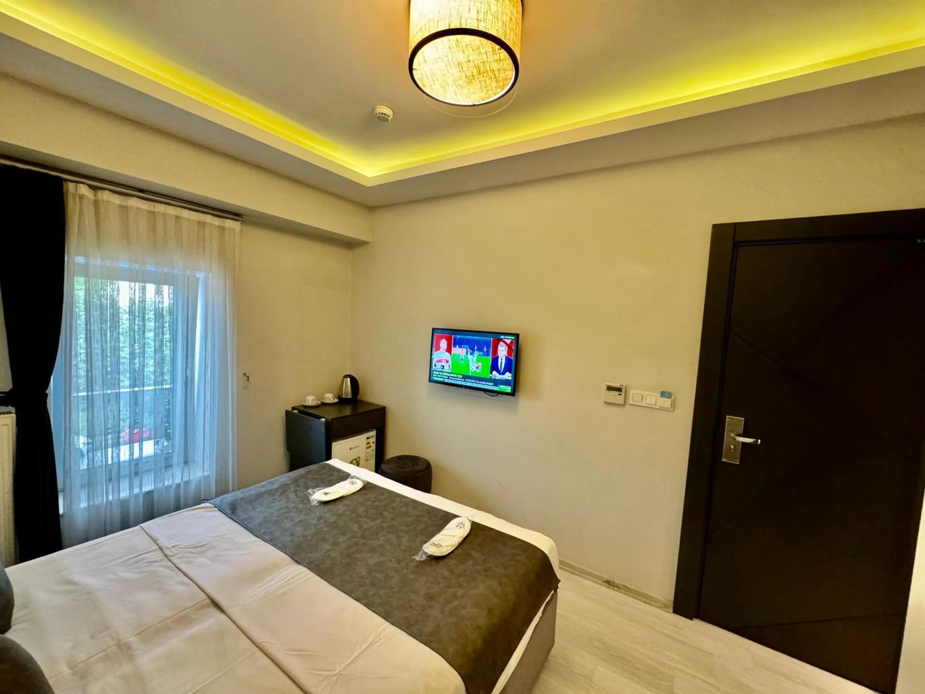 Bed in Aram Edessa Hotel