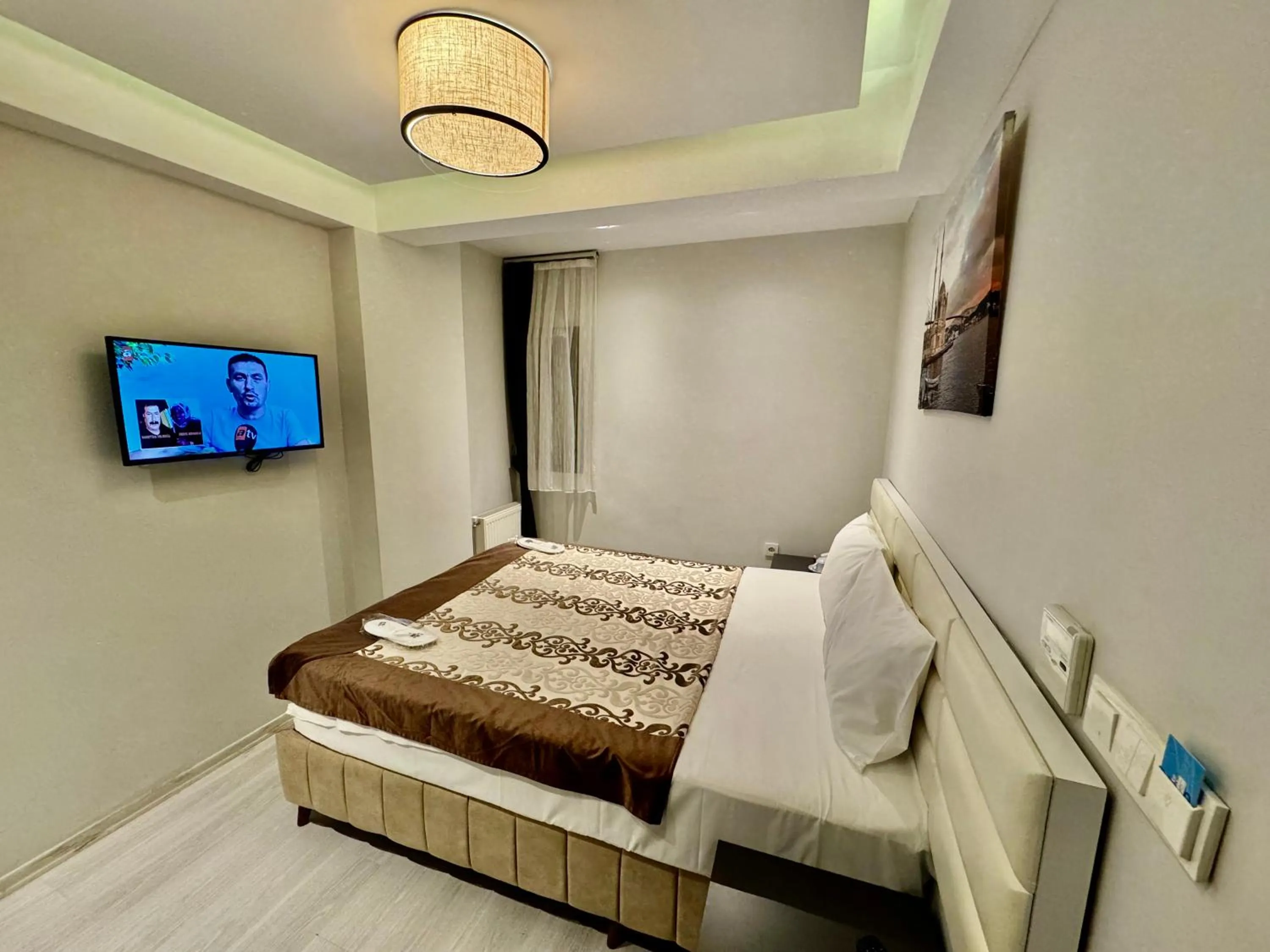 Bed in Aram Edessa Hotel