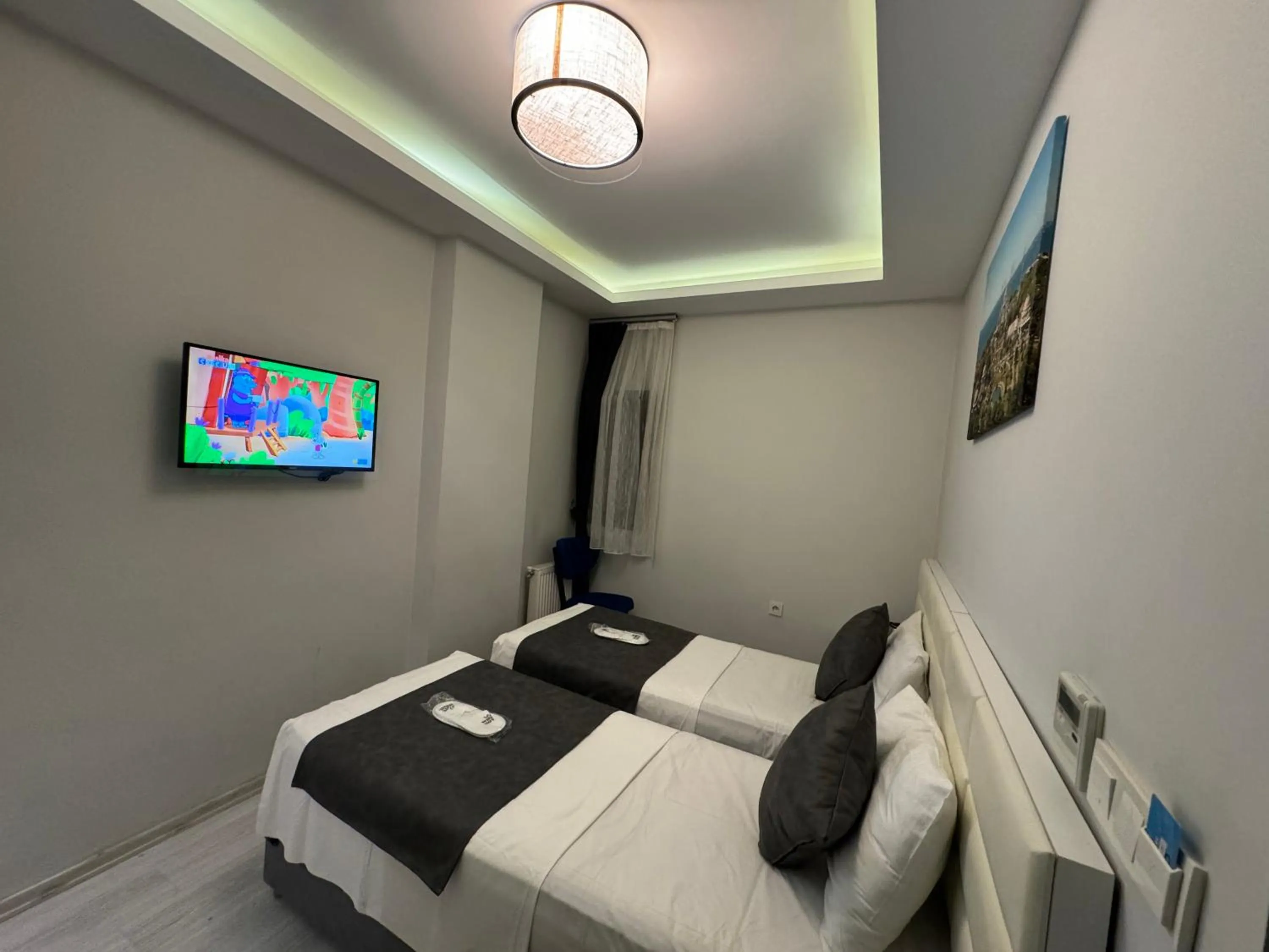 Bed in Aram Edessa Hotel