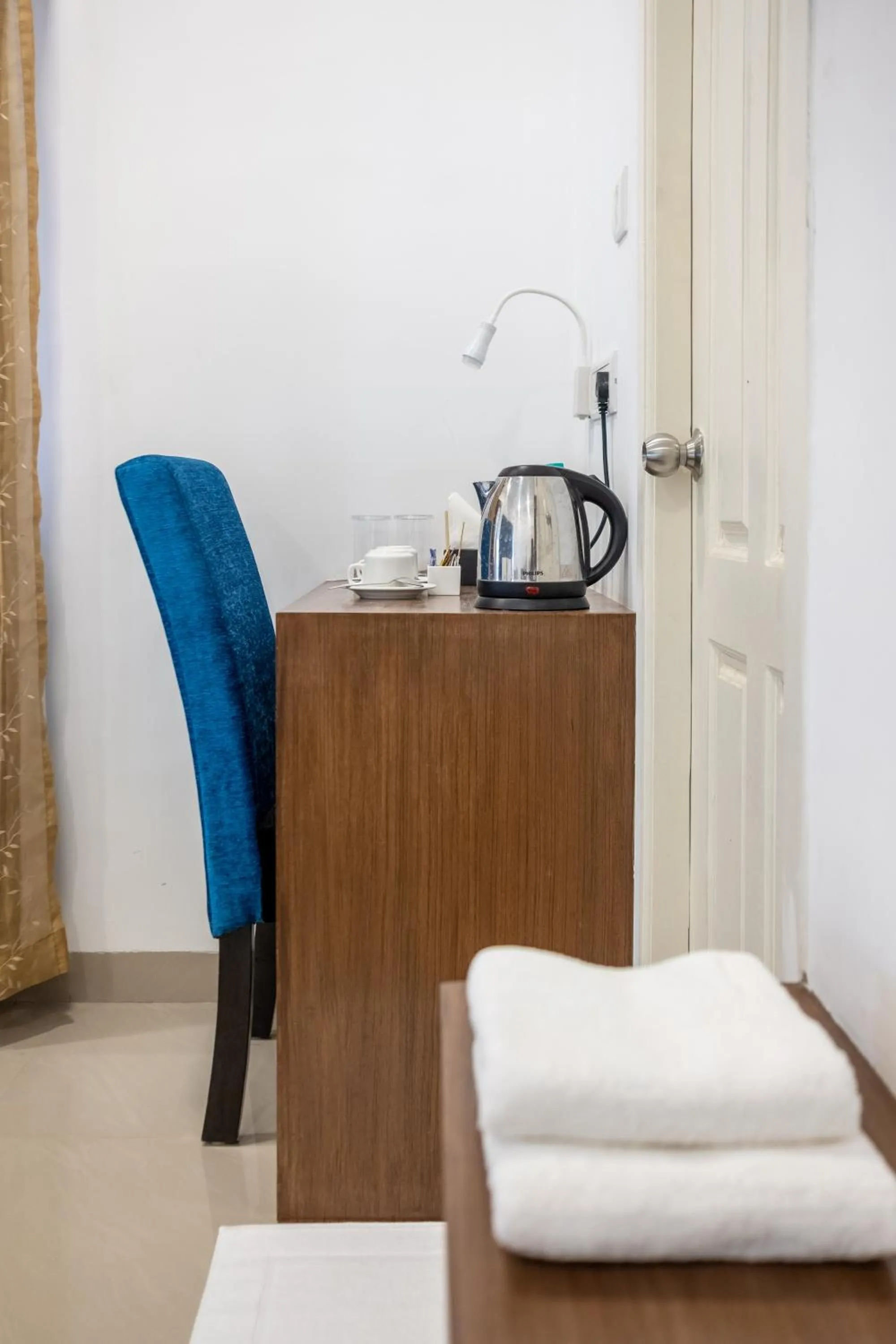 Coffee/tea facilities, Bed in La Woods Village Resort