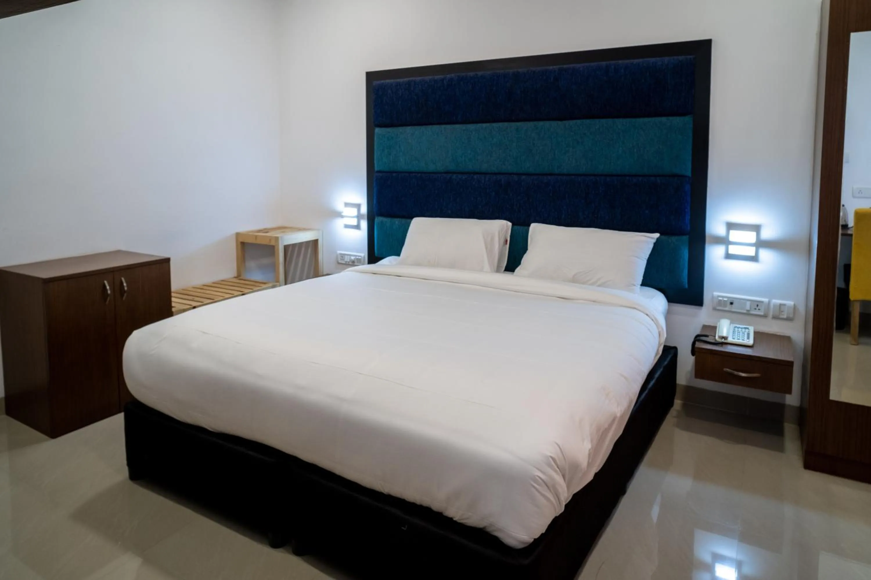 Bed in La Woods Village Resort