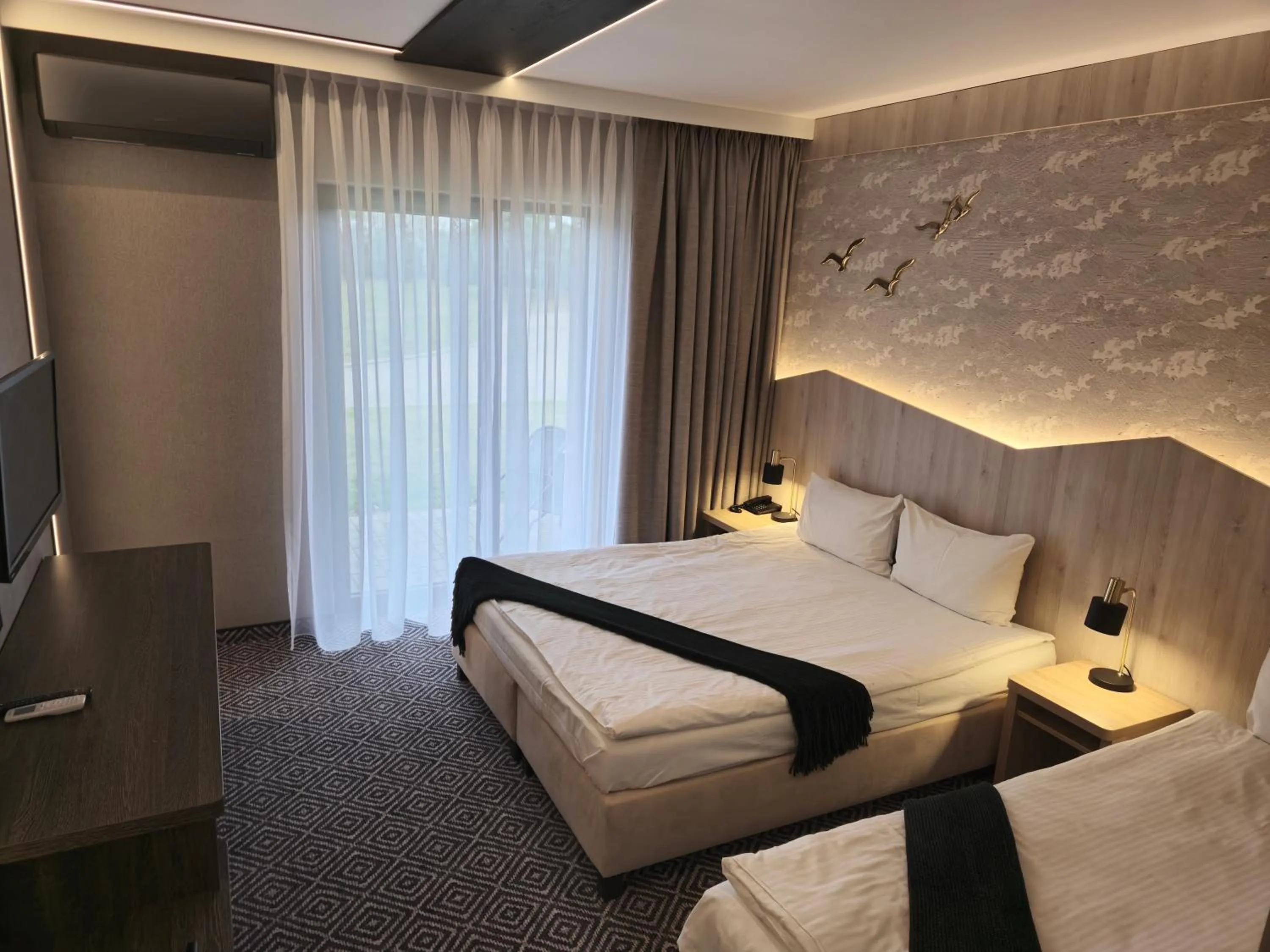 air conditioner, Bed in Mikołajki Resort Hotel & Spa Jora Wielka