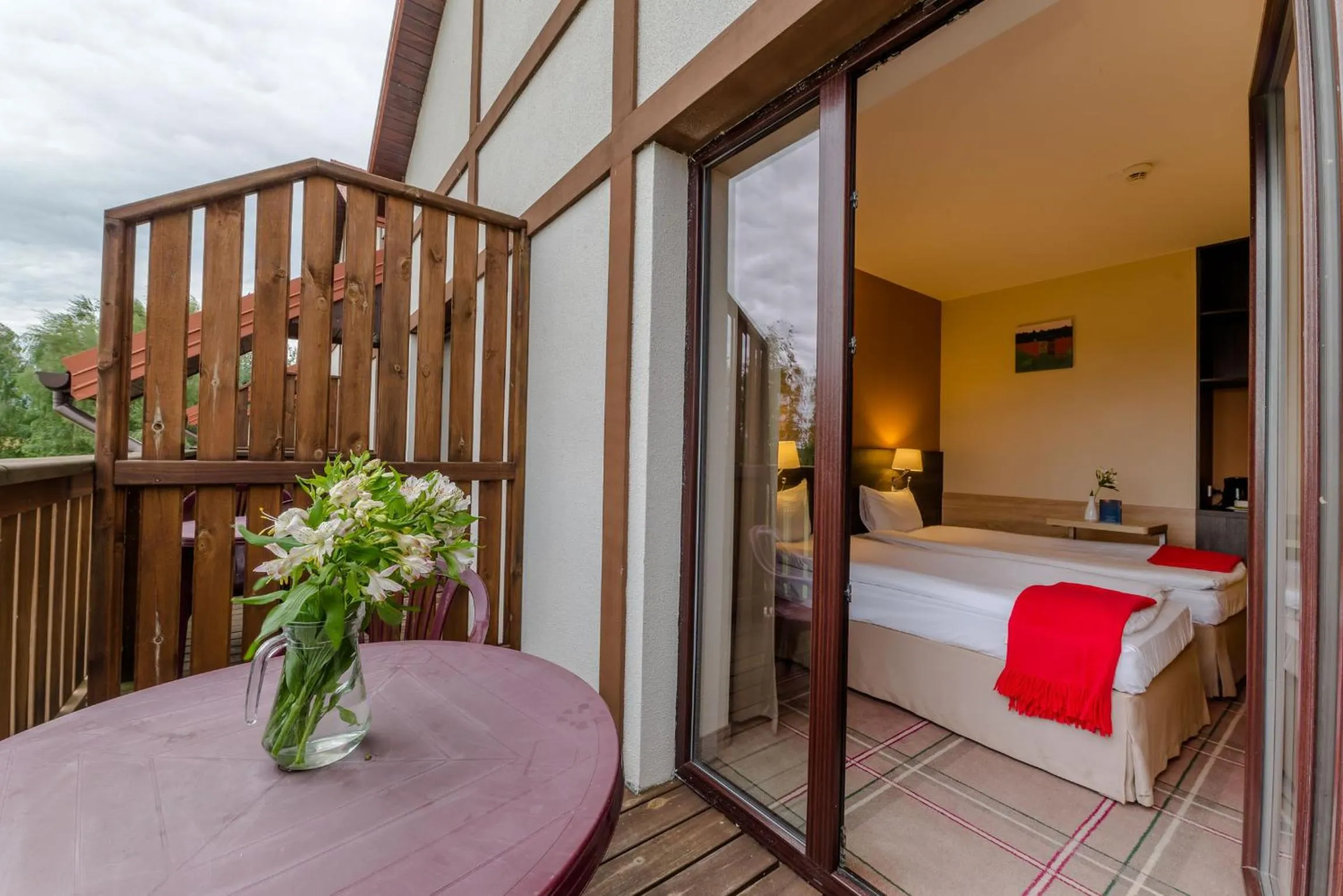 Balcony/Terrace, Bed in Mikołajki Resort Hotel & Spa Jora Wielka