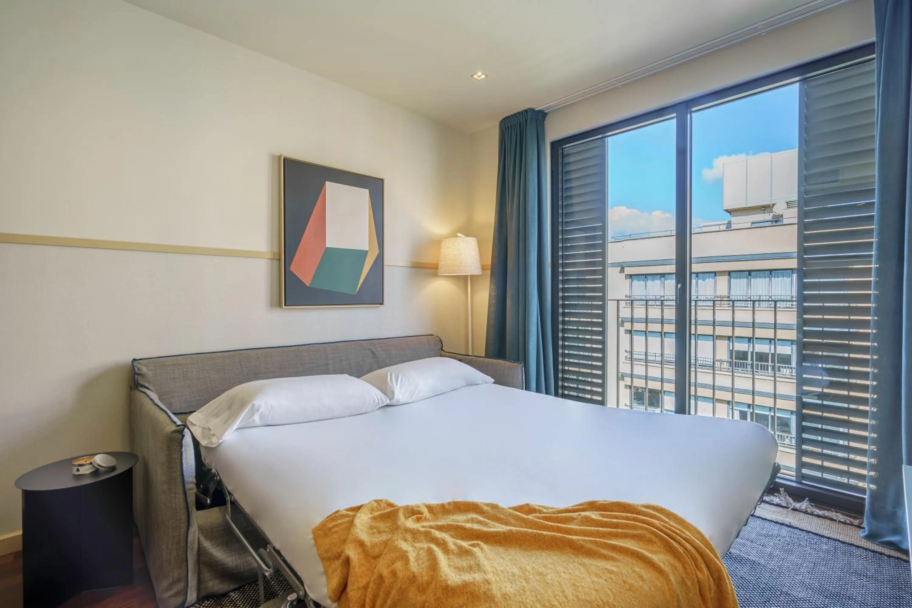 Bed in Aspasios Diagonal Art Apartments