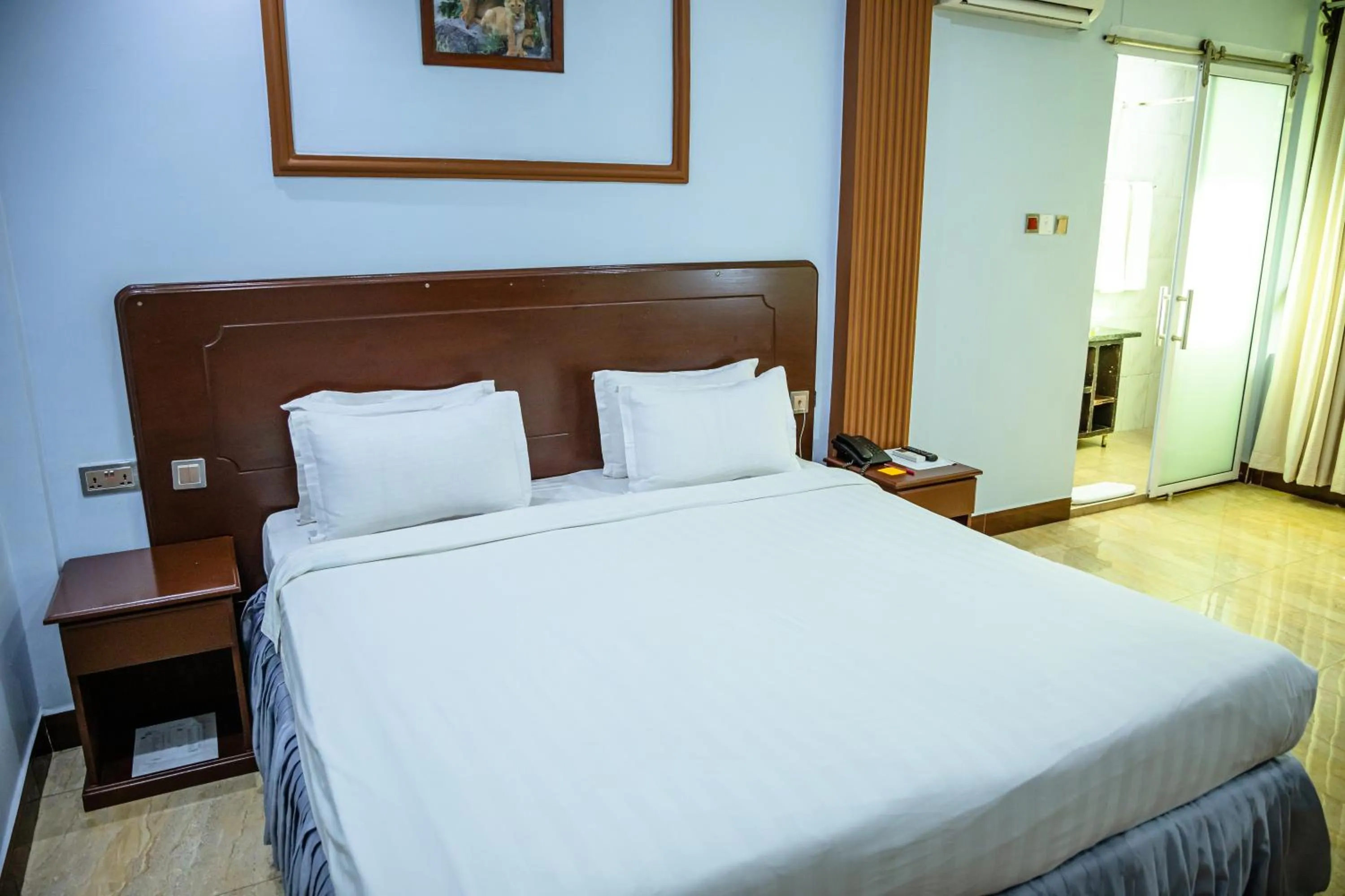 Bed in Green Mountain Hotel