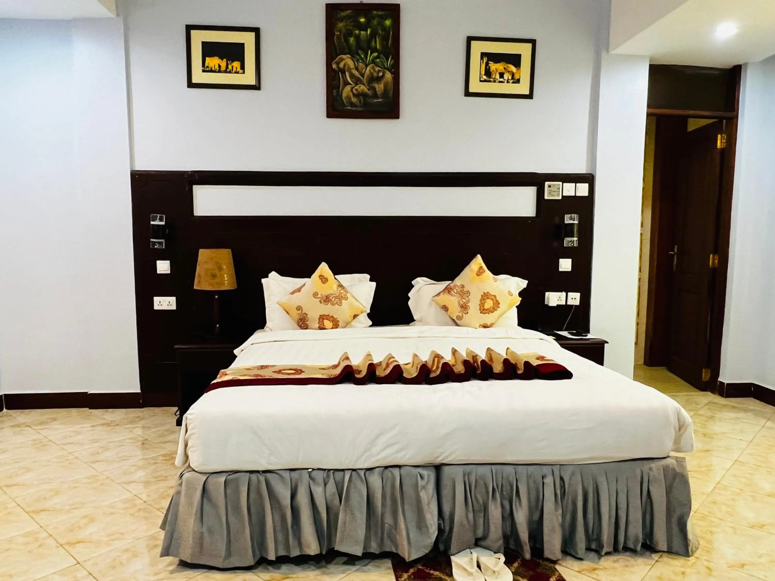 Bed in Green Mountain Hotel