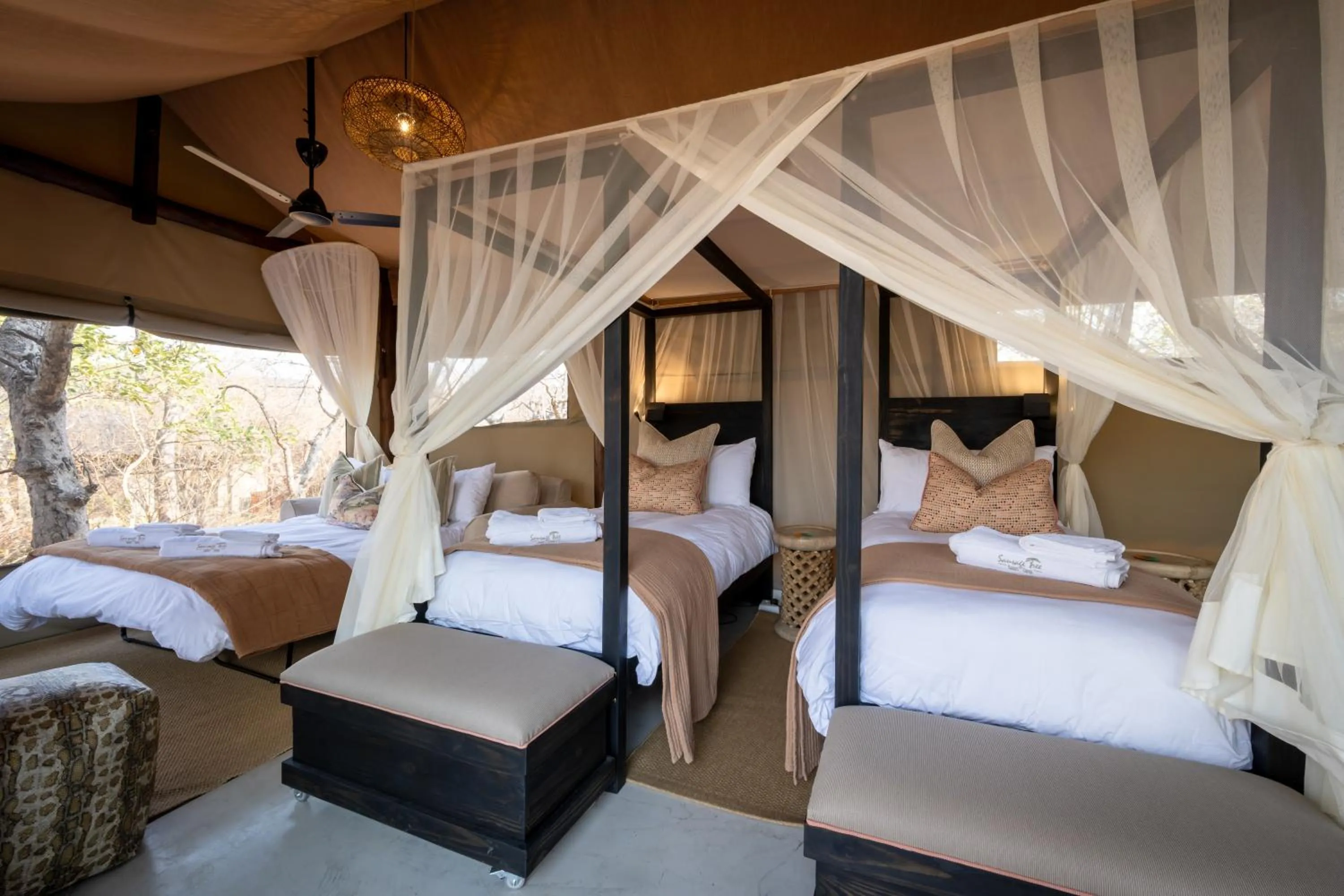 Bed in Sausage Tree Safari Camp