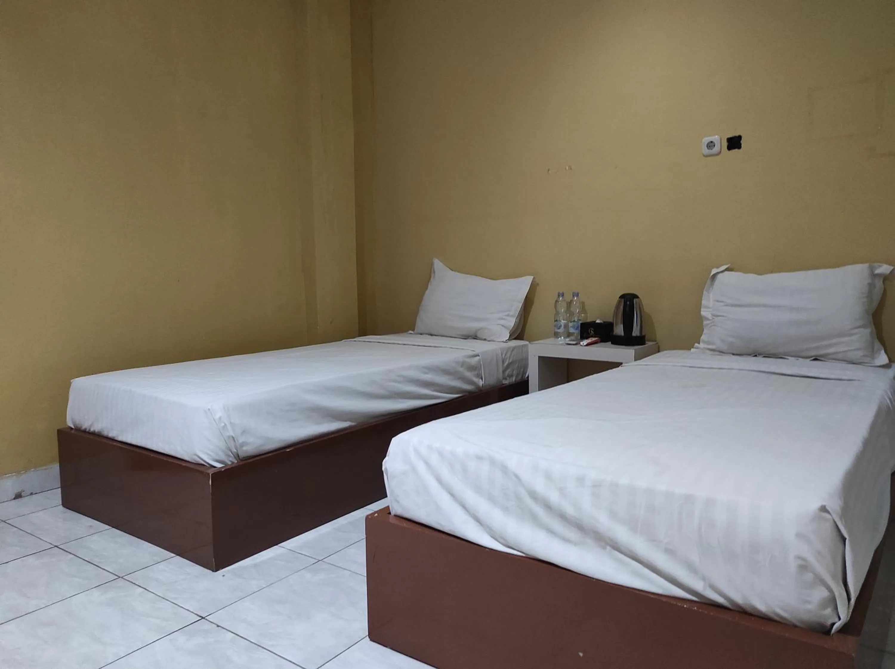 Bedroom, Bed in Hotel O Emmy Homestay Syariah