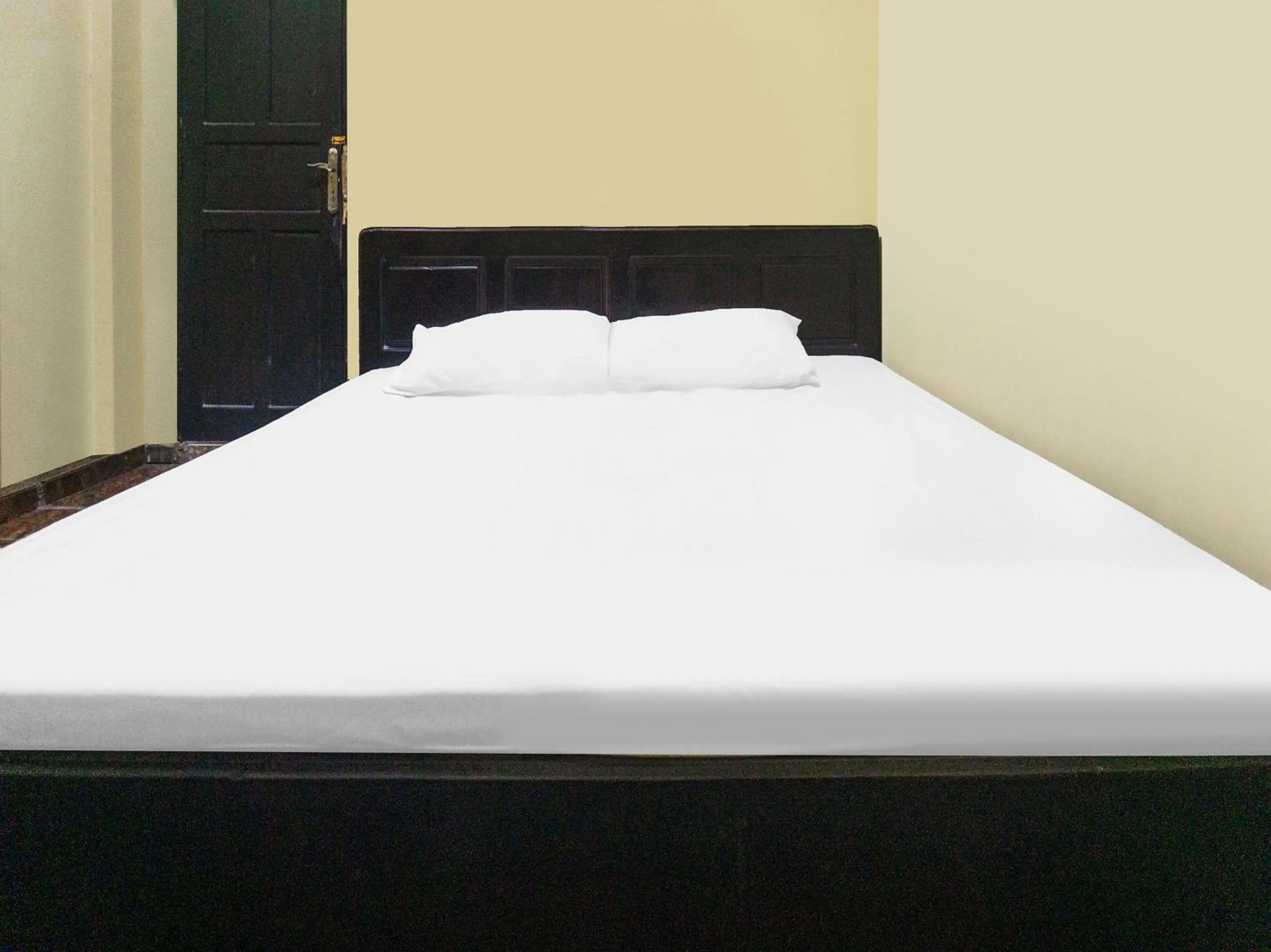 Bedroom, Bed in Hotel O Emmy Homestay Syariah