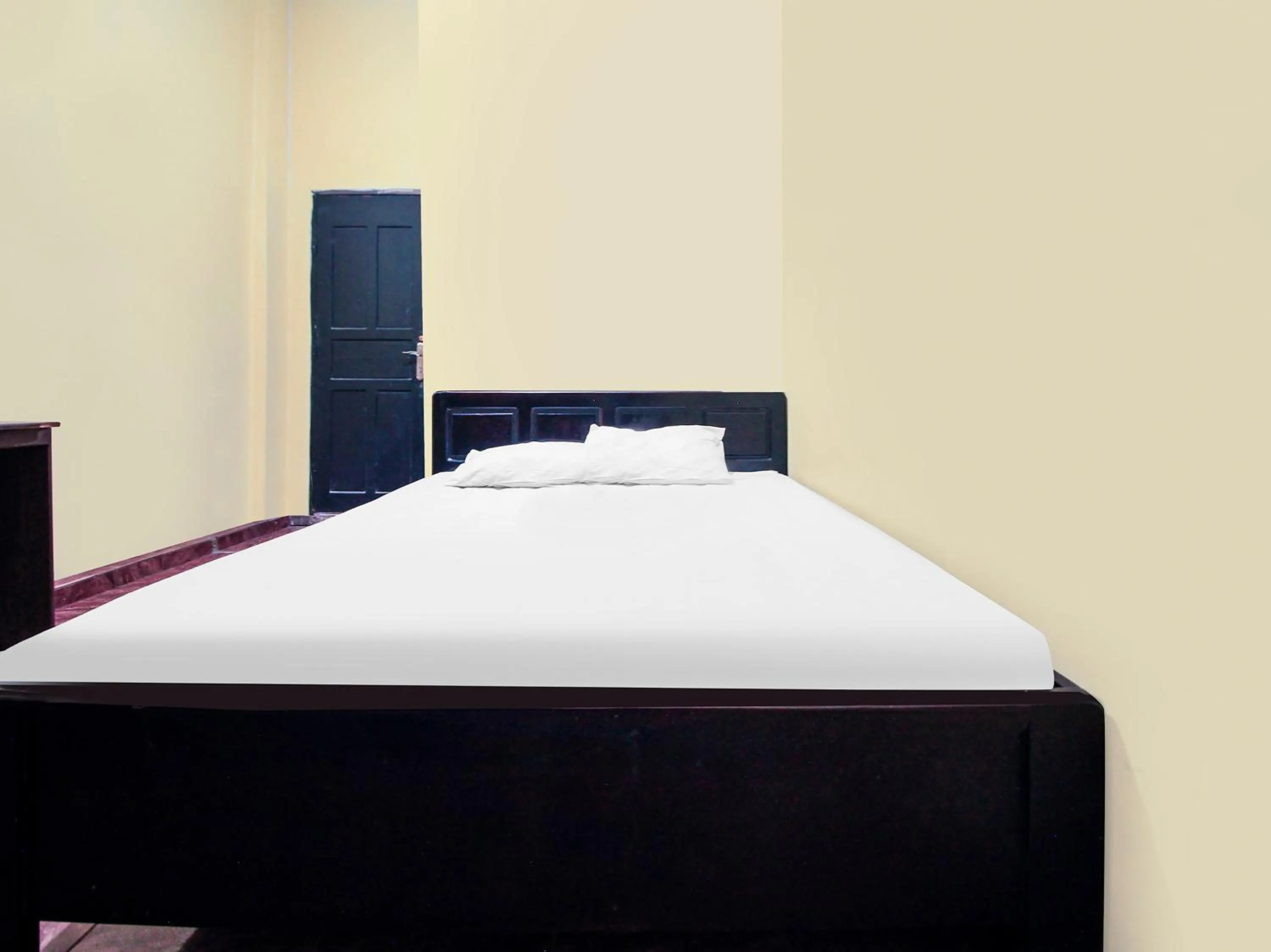 Bedroom, Bed in Hotel O Emmy Homestay Syariah