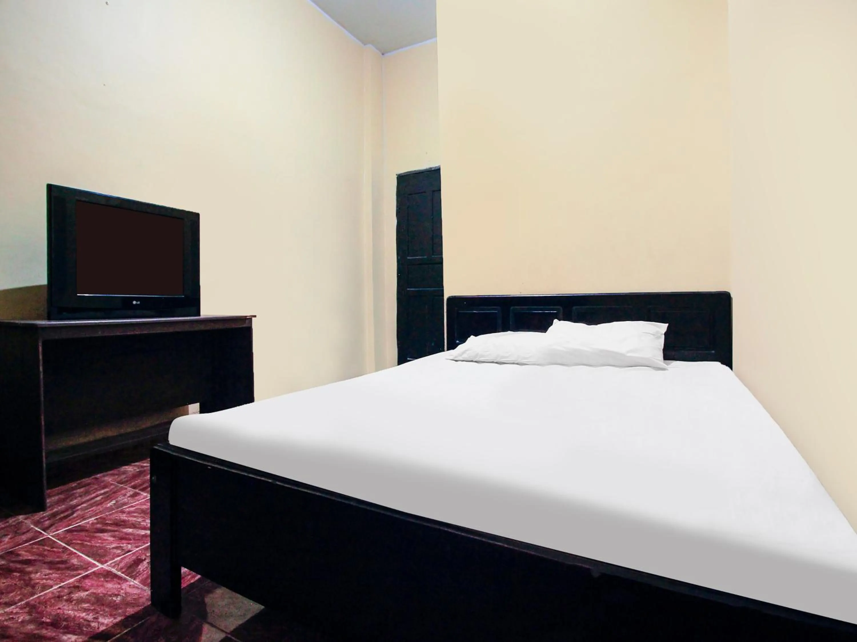 Bedroom, Bed in Hotel O Emmy Homestay Syariah