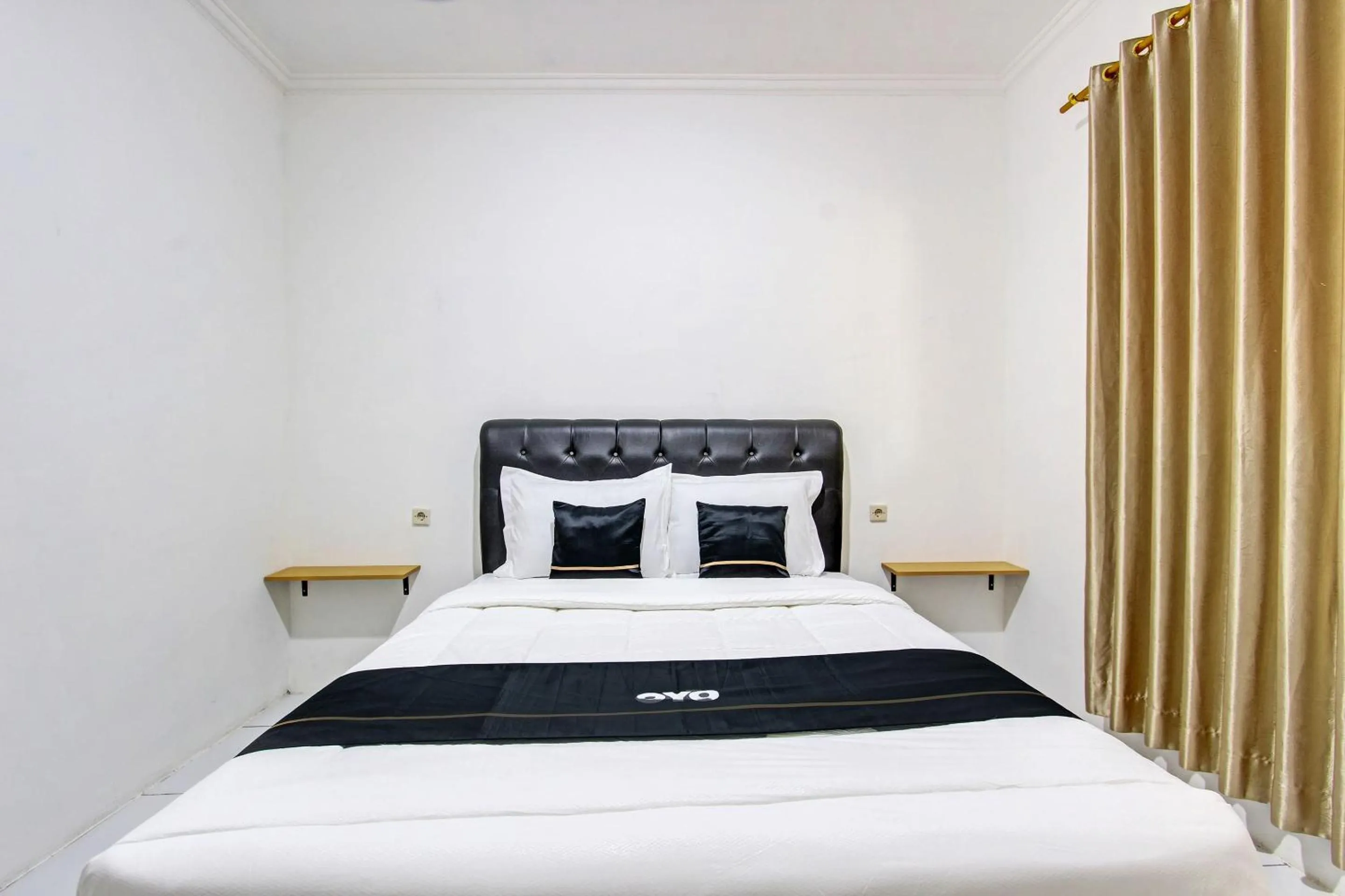 Bedroom in Capital O 93449 The Boekit Song Putri Resort