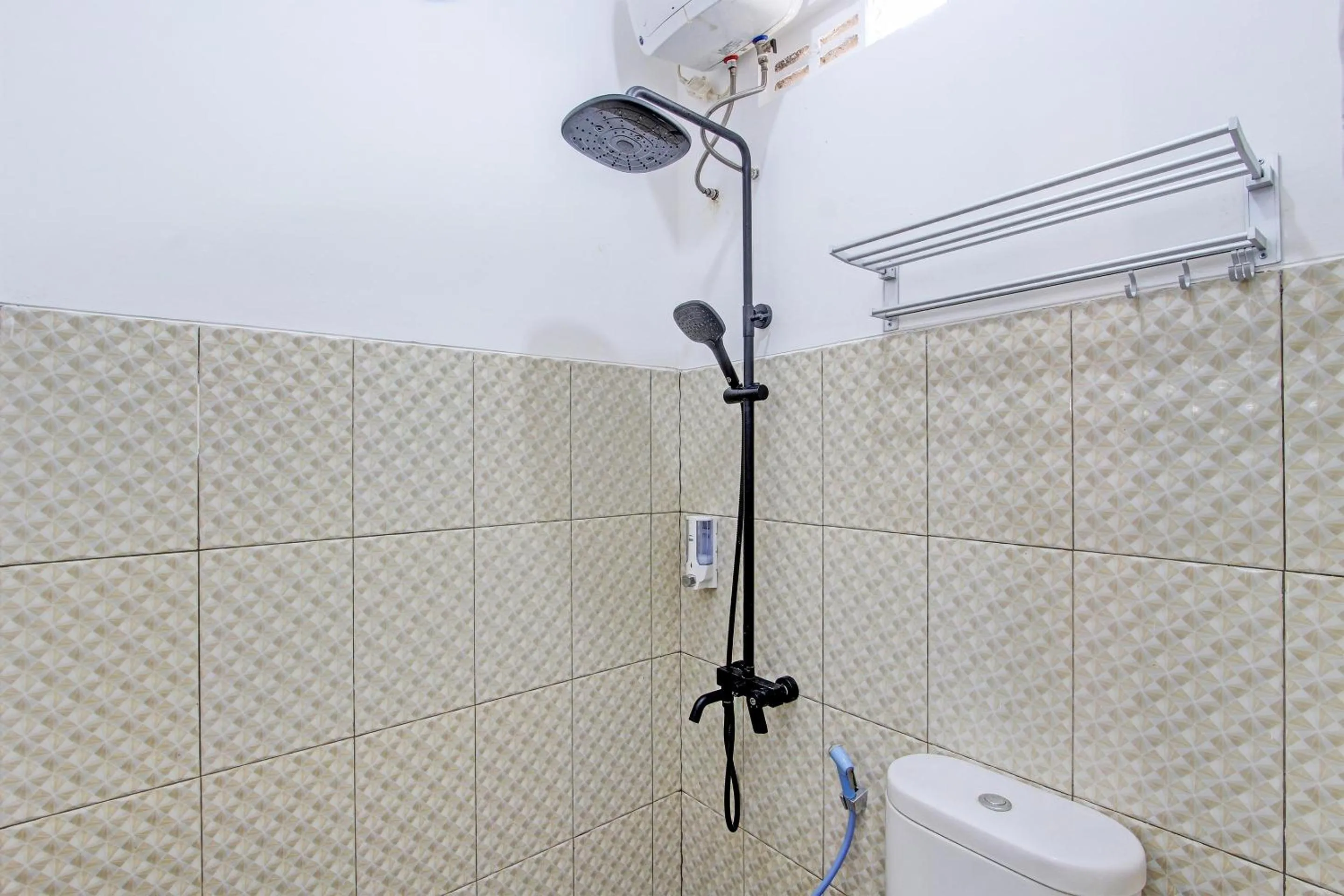 Bathroom in Capital O 93449 The Boekit Song Putri Resort