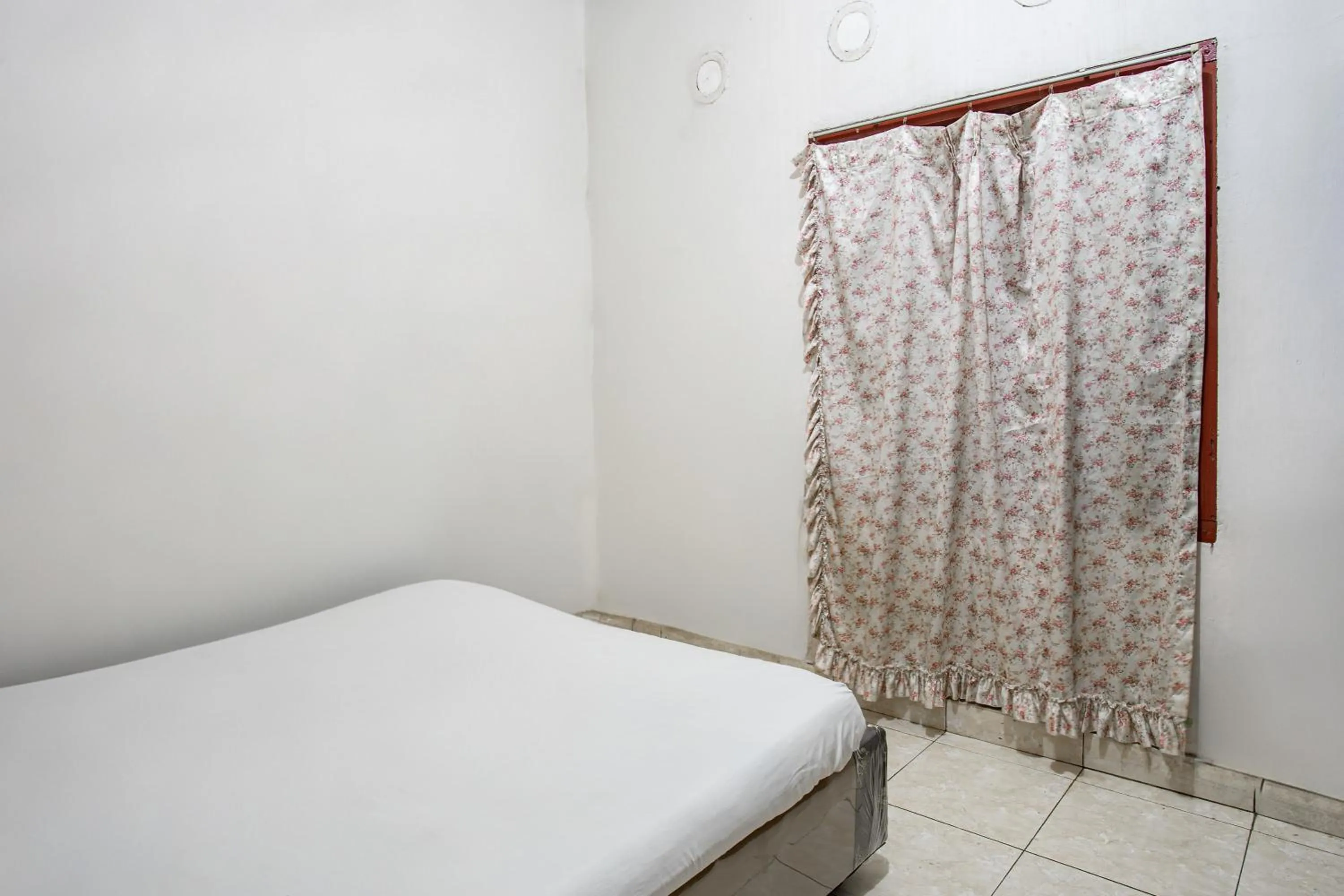 Bedroom, Bed in Hotel O Penginapan Tulimario Syariah