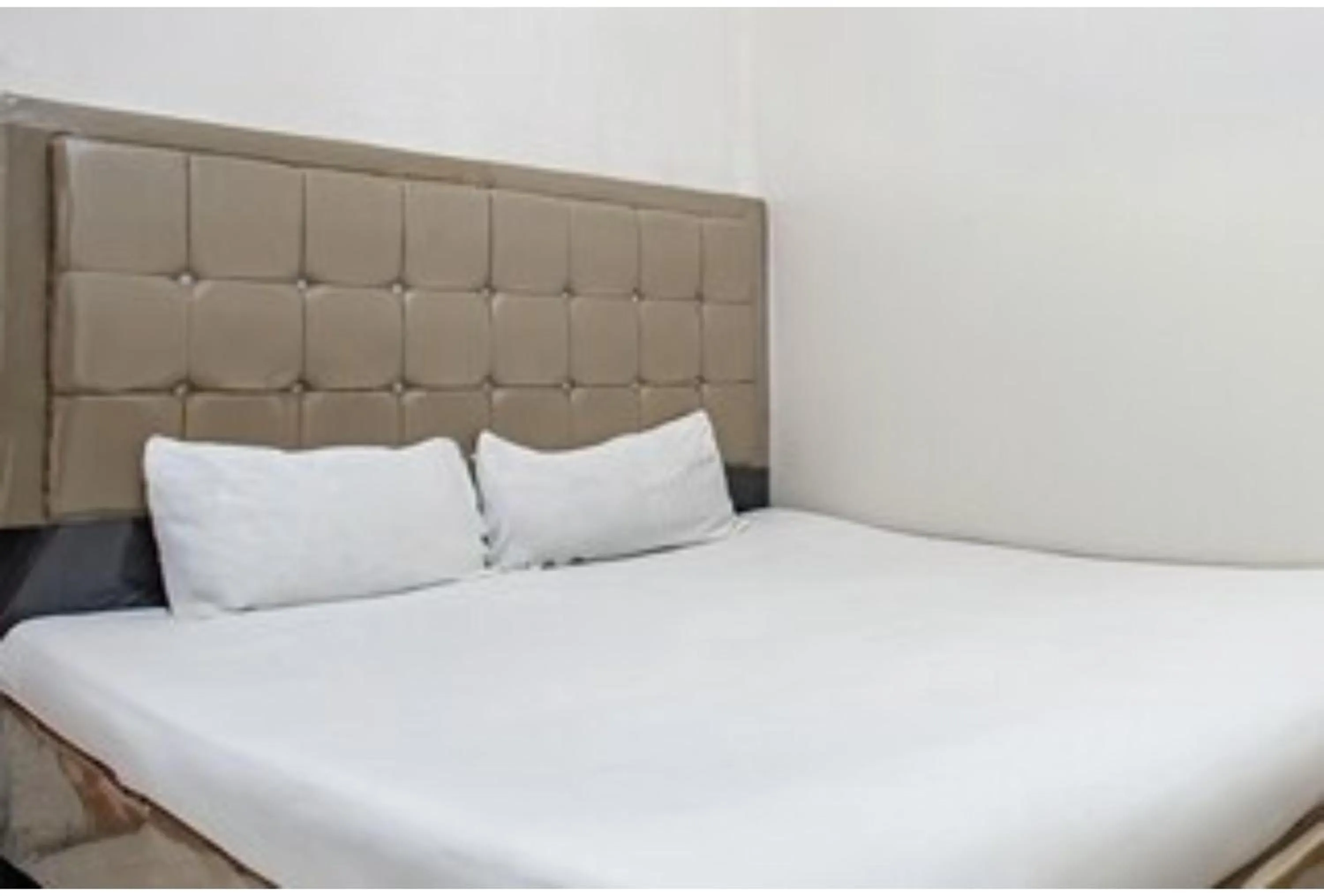 Bedroom, Bed in Hotel O Penginapan Tulimario Syariah