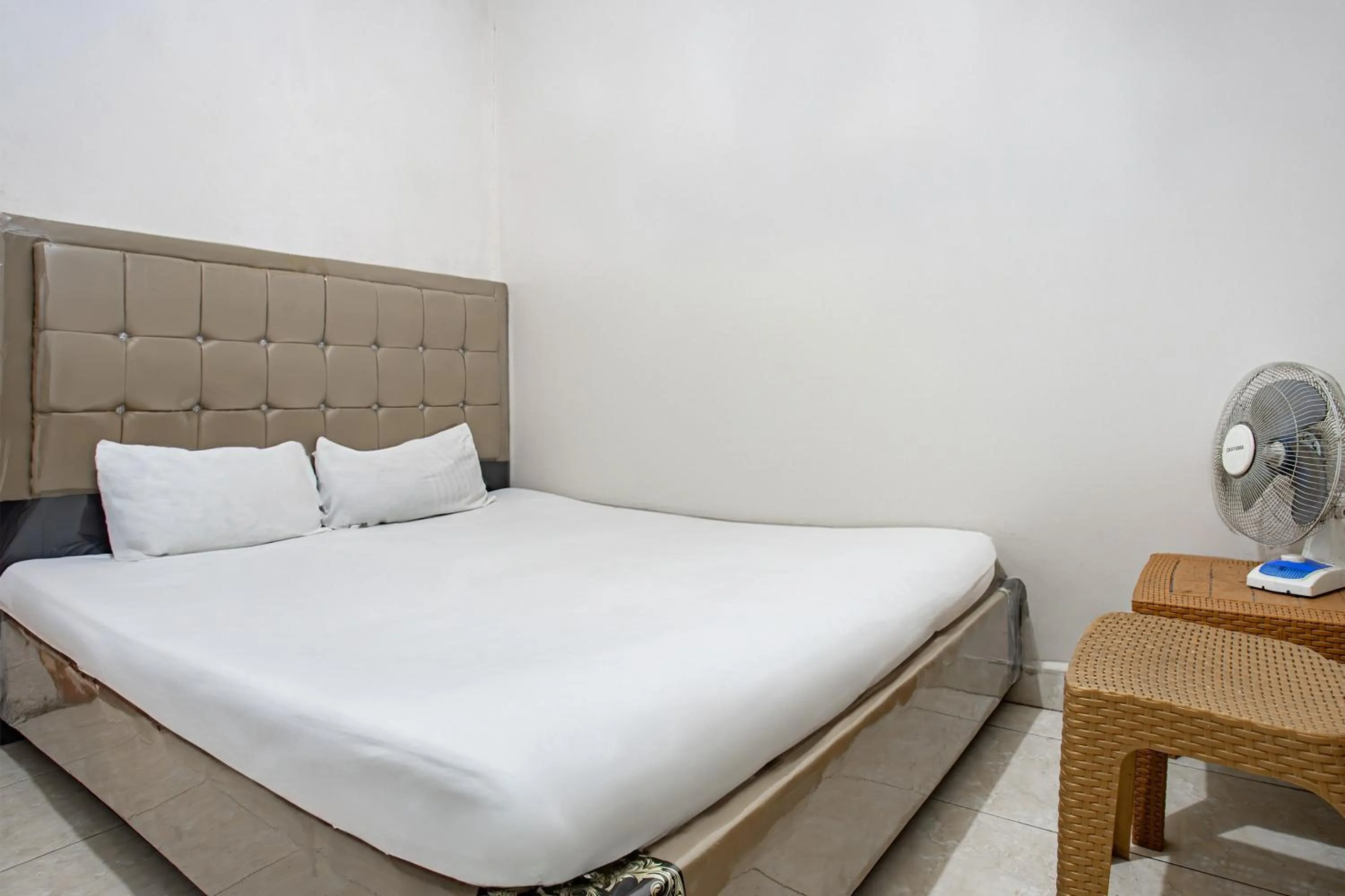 Bedroom, Bed in Hotel O Penginapan Tulimario Syariah