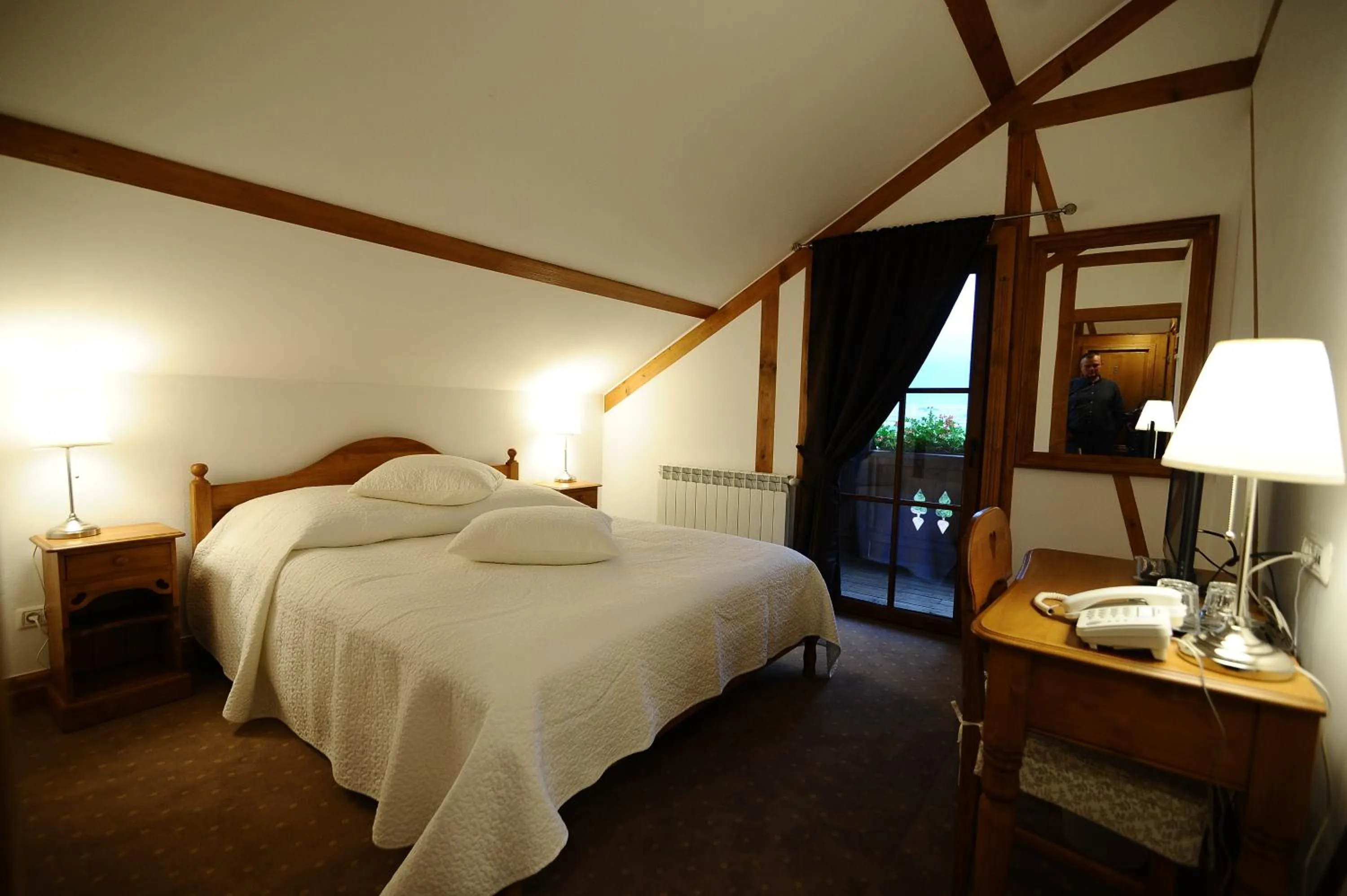 Photo of the whole room, Bed in Pensiunea Tohanu Vechi