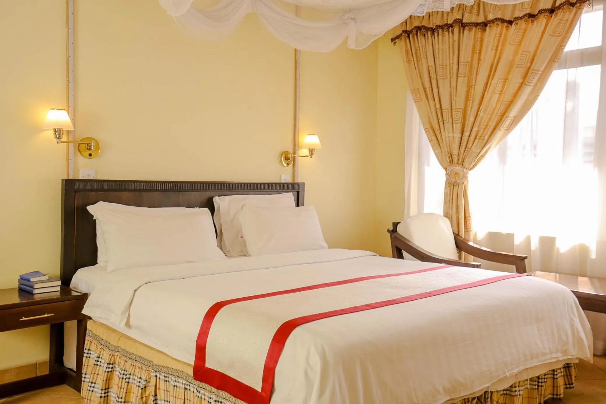 Bed in New Safari Hotel