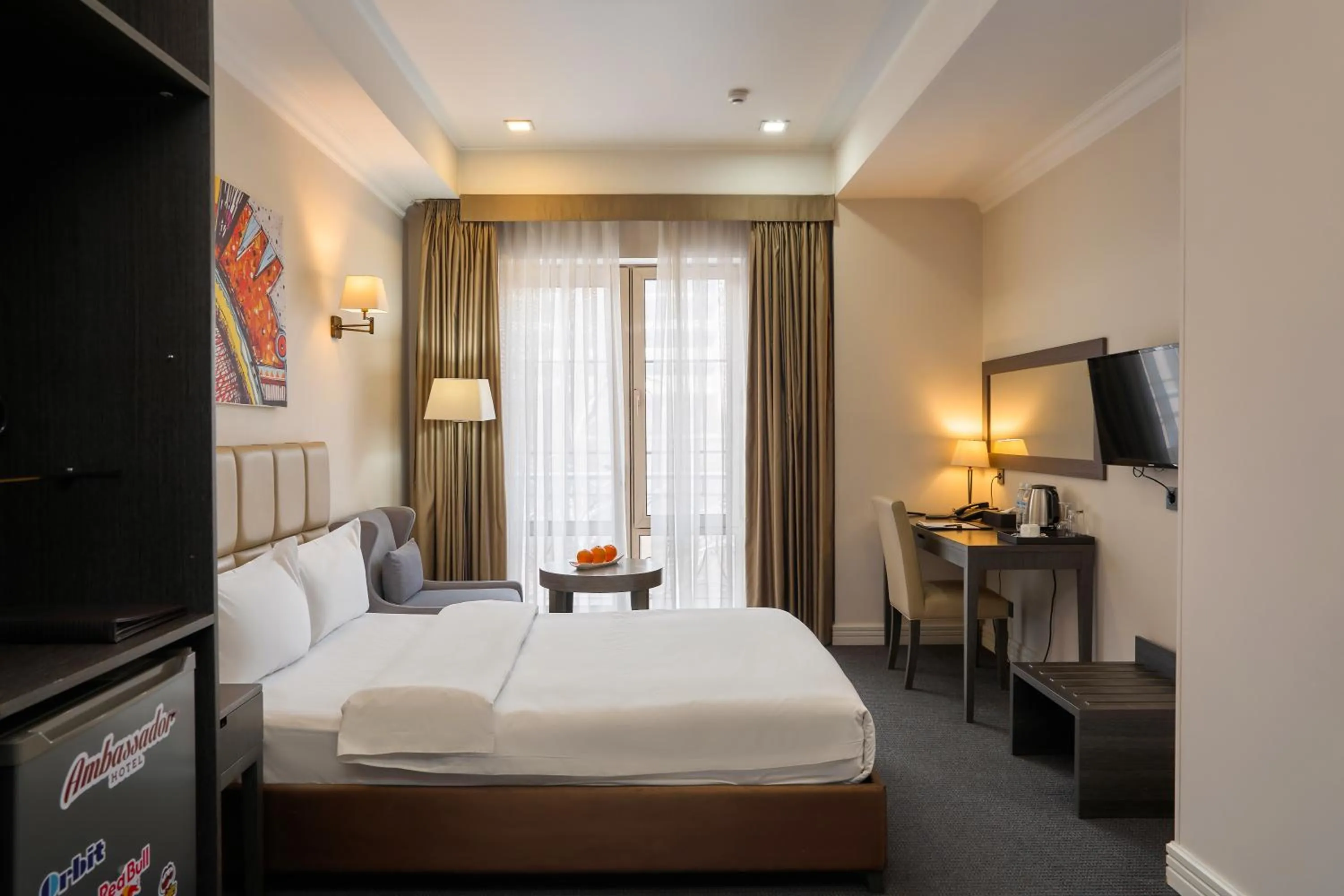 Bed in Ambassador Hotel