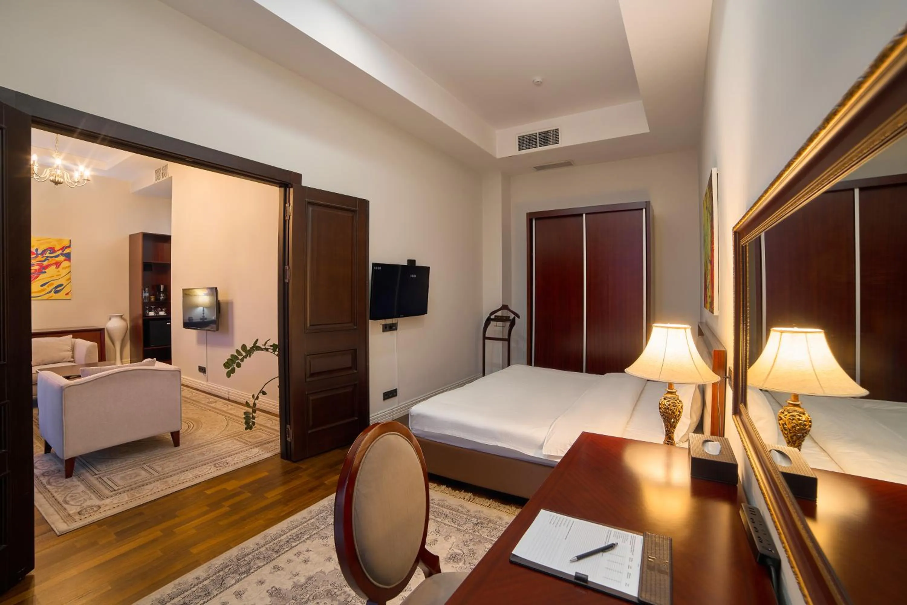 Bed in Ambassador Hotel