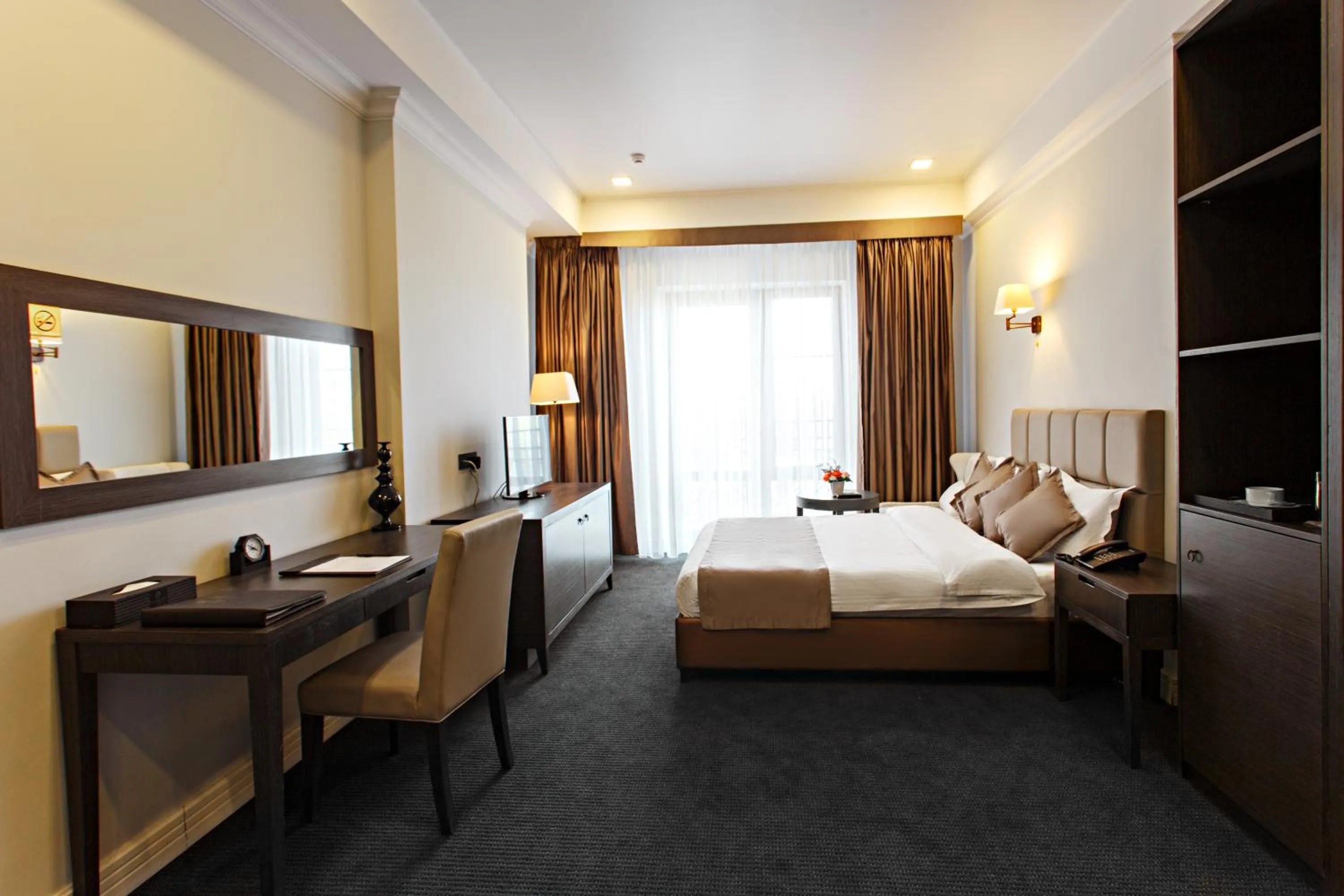 Bed in Ambassador Hotel