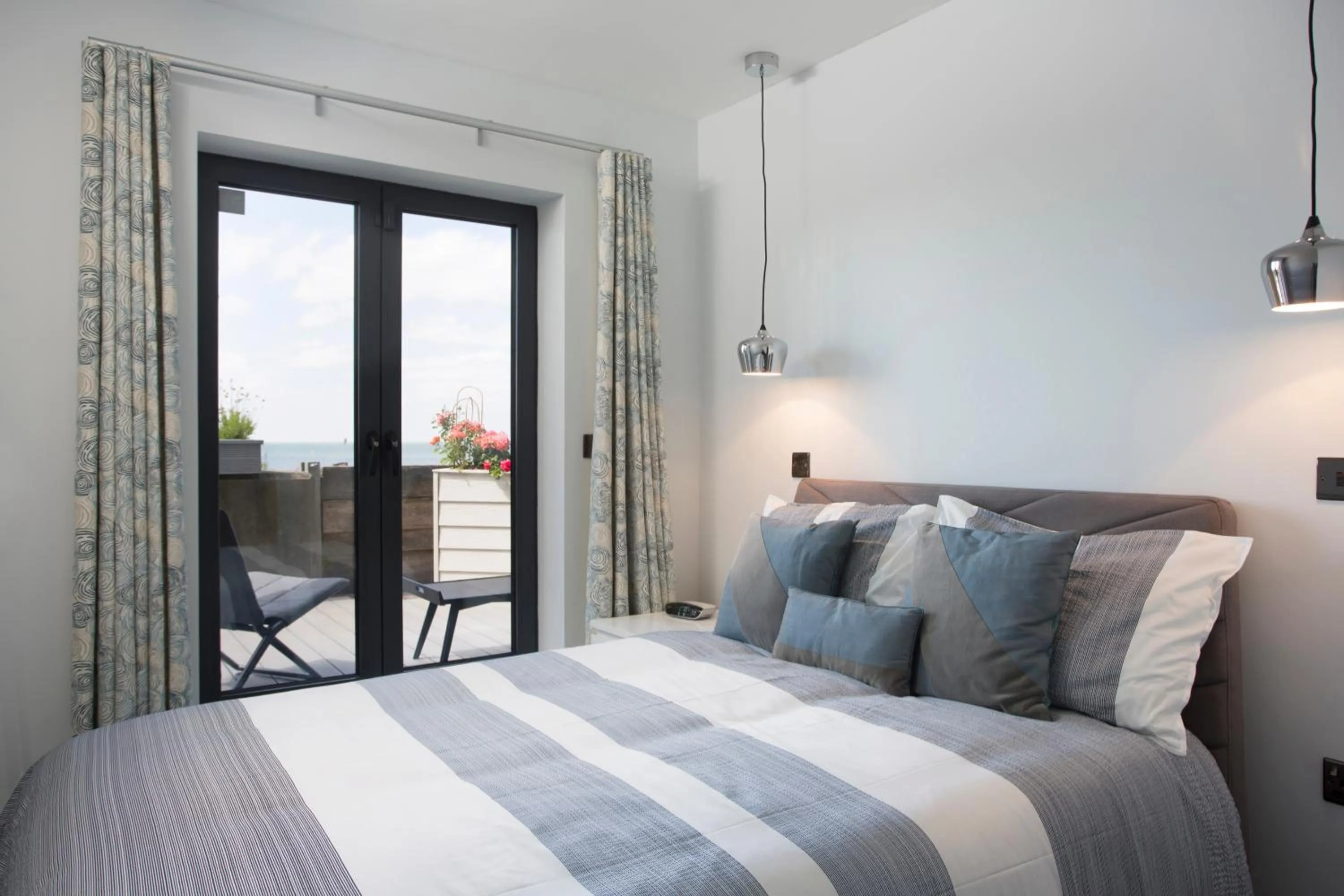 Shower, Bed in Sea Sunset Cottage