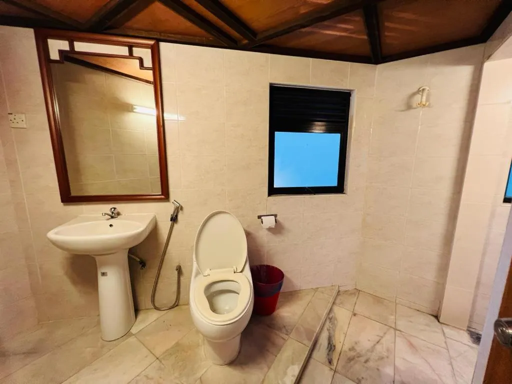 Bathroom in Hotel O I.villa Inn