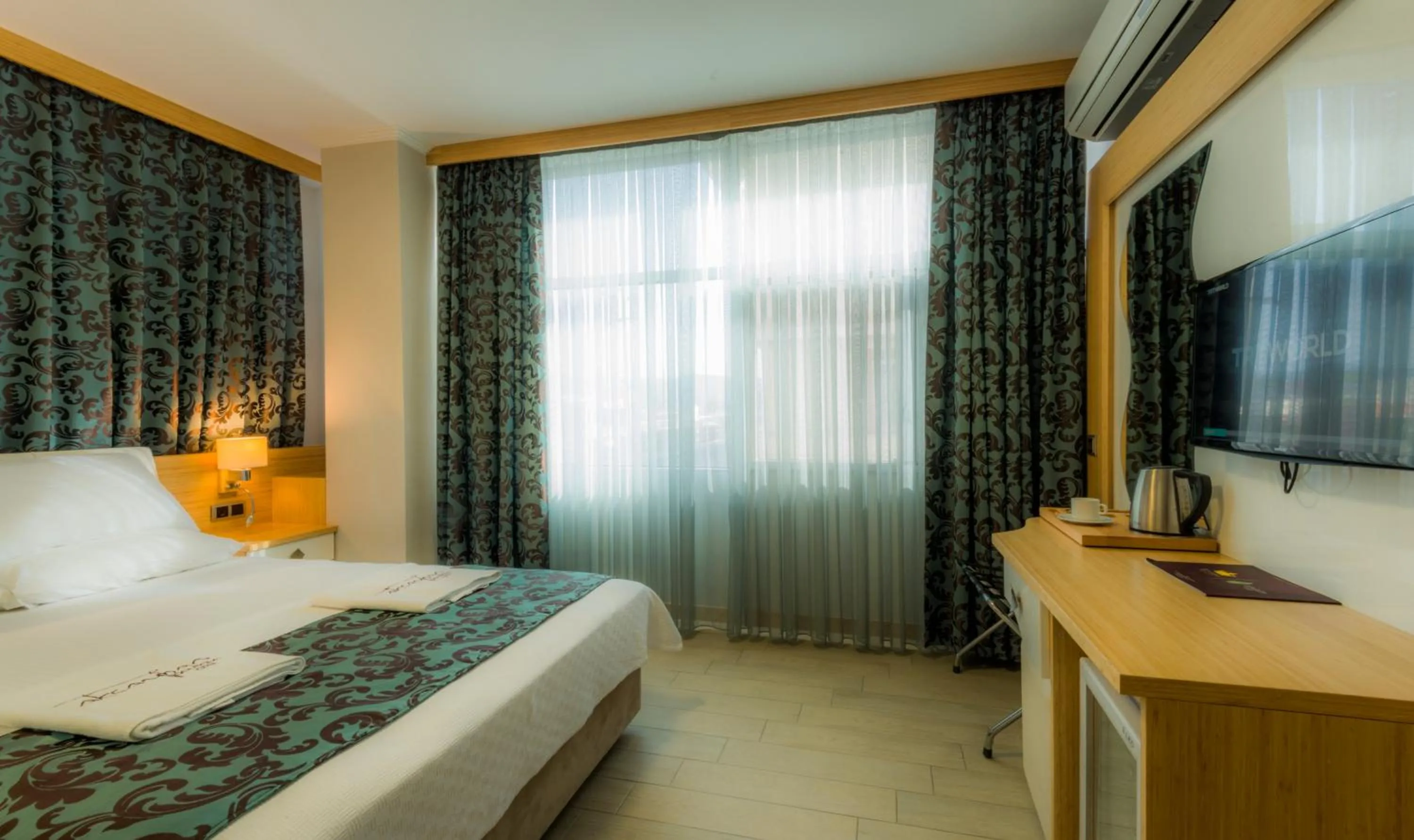 TV and multimedia, Bed in Akcayhan Hotel