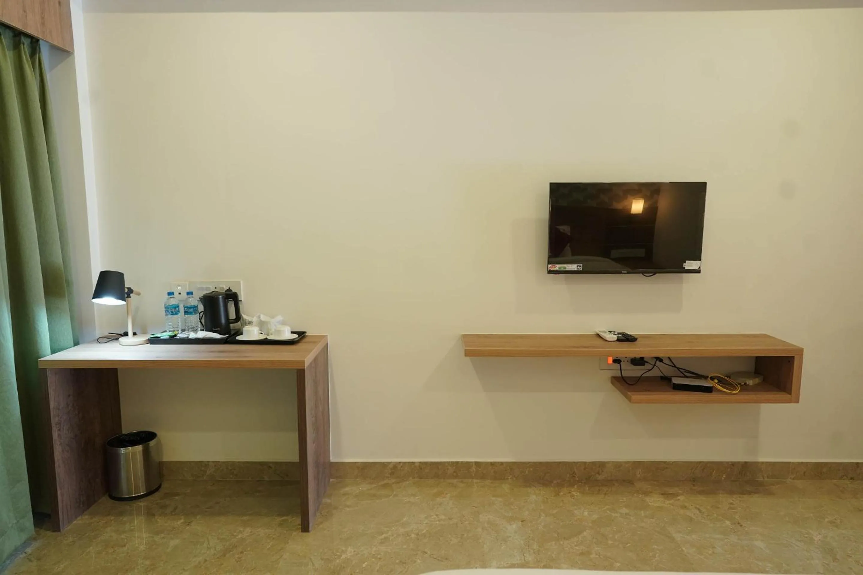 TV and multimedia in HOTEL VKJ INN Aluva