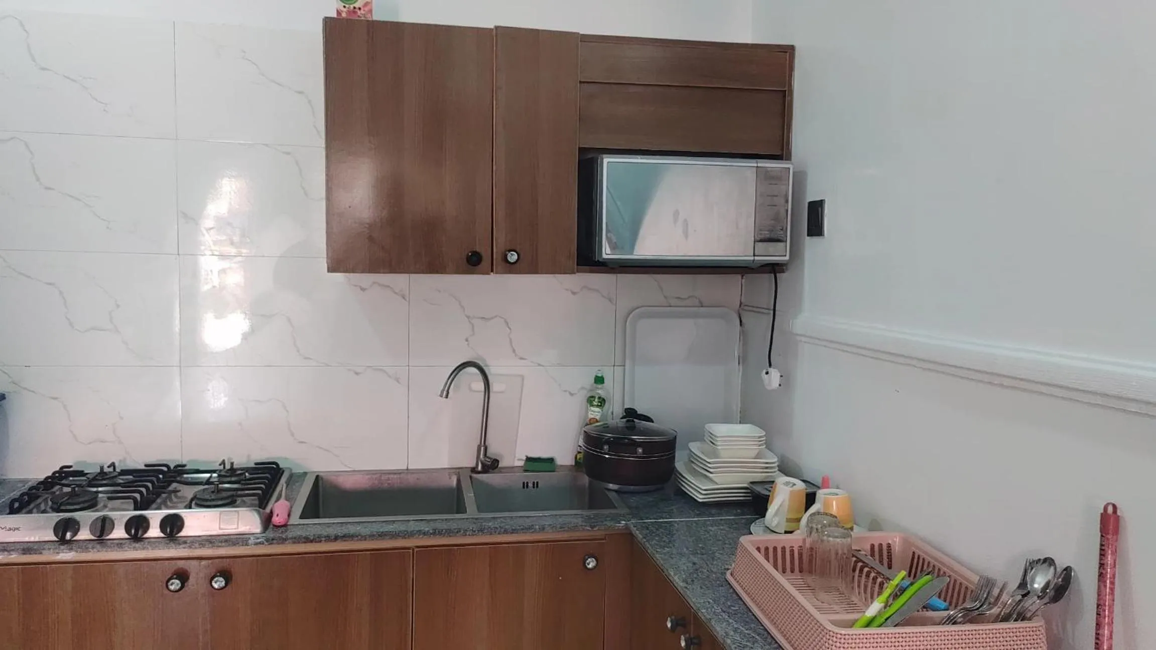 Kitchen or kitchenette in Skenyo Hotel & Apartments