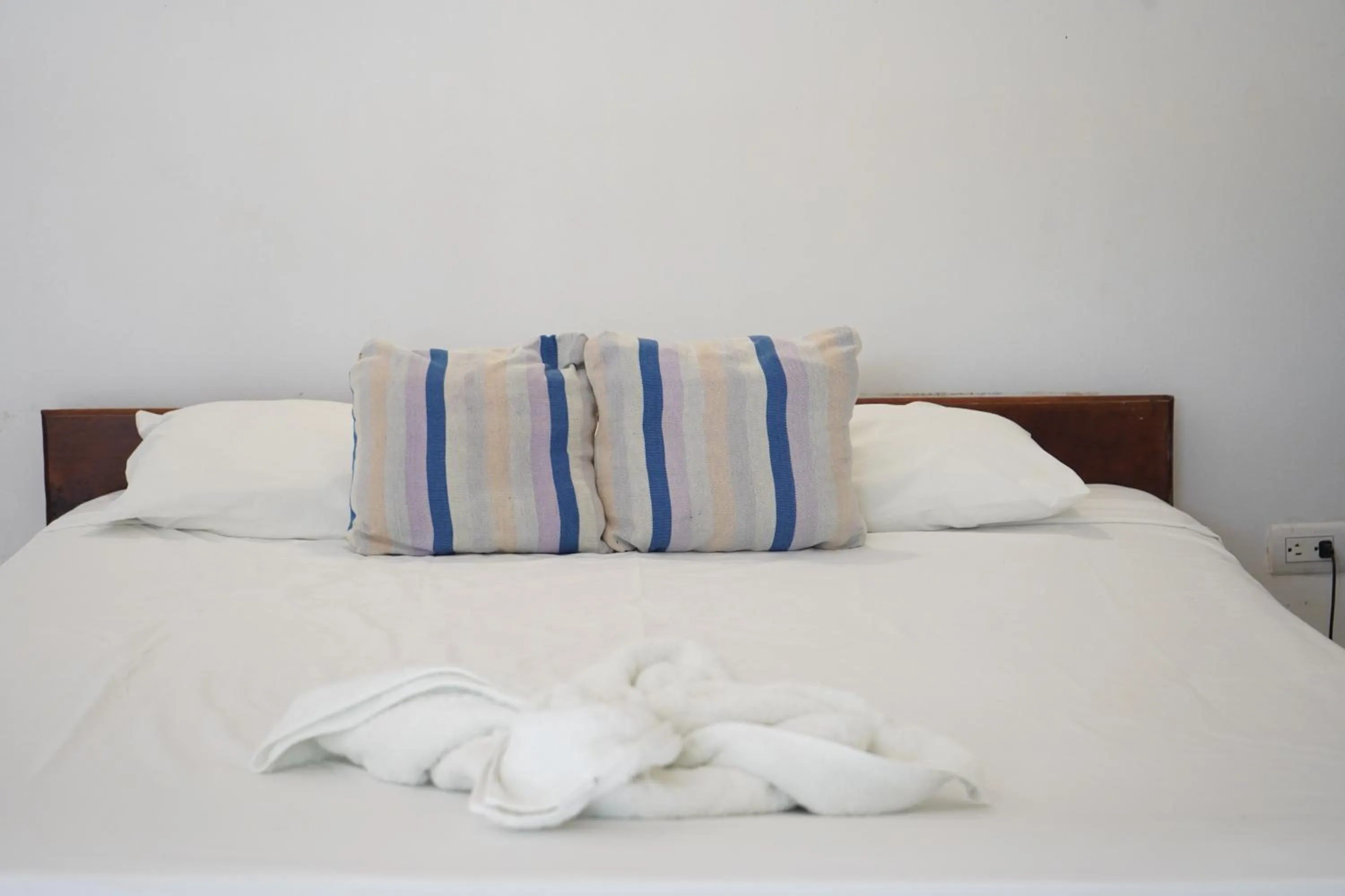 Bed in El Pacifico Hotel