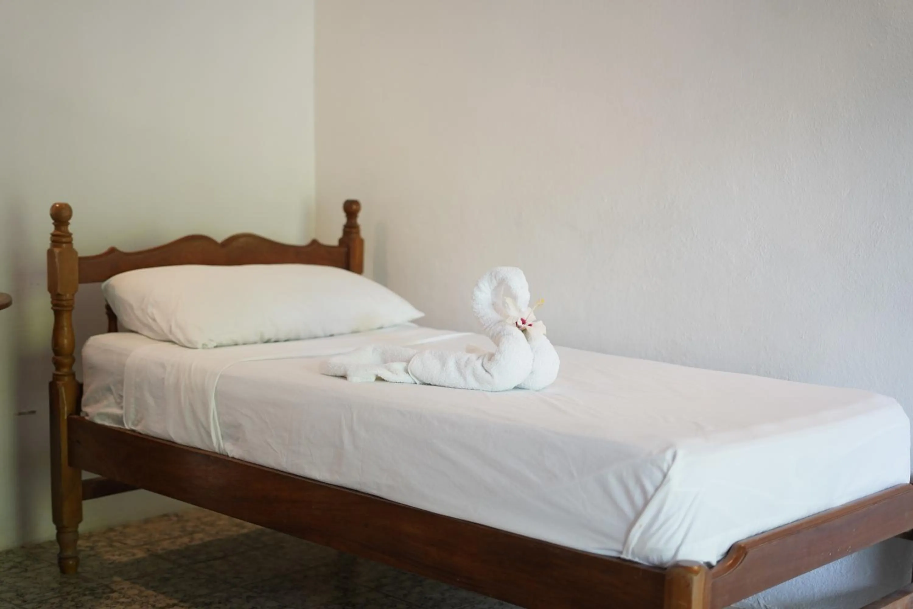 Bed in El Pacifico Hotel