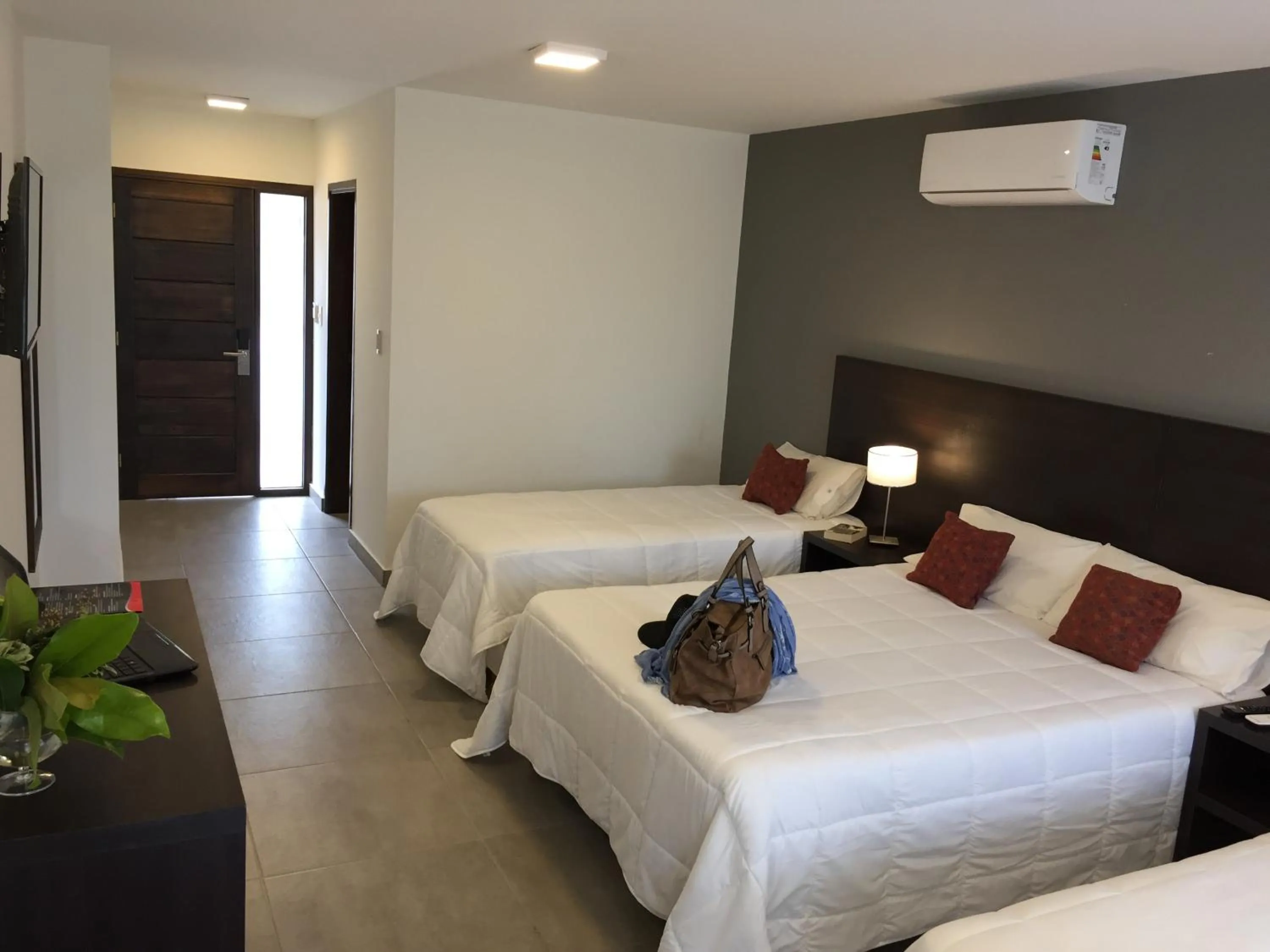 Bed in San Miguel Plaza Hotel All Inclusive