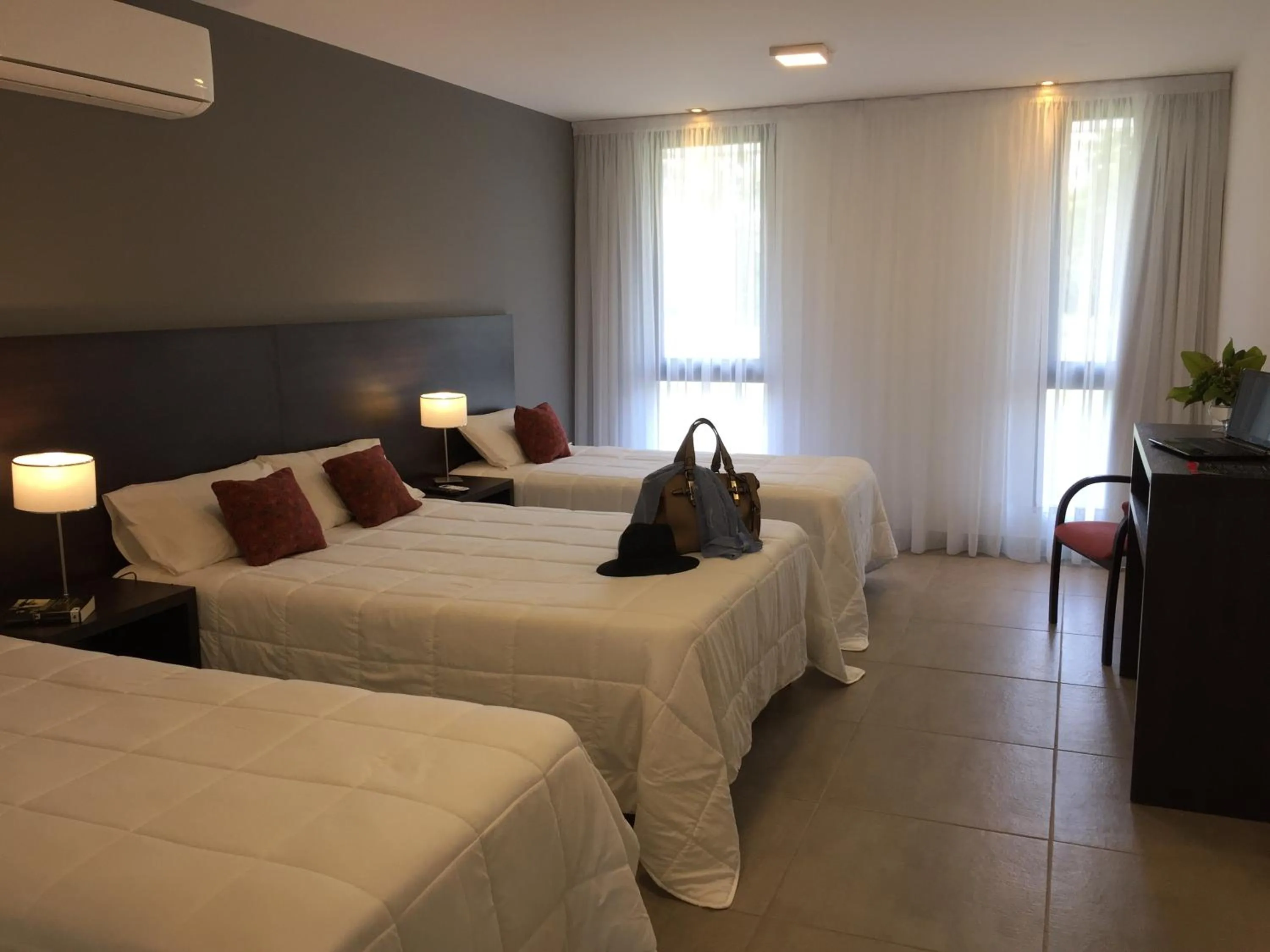 Bed in San Miguel Plaza Hotel All Inclusive